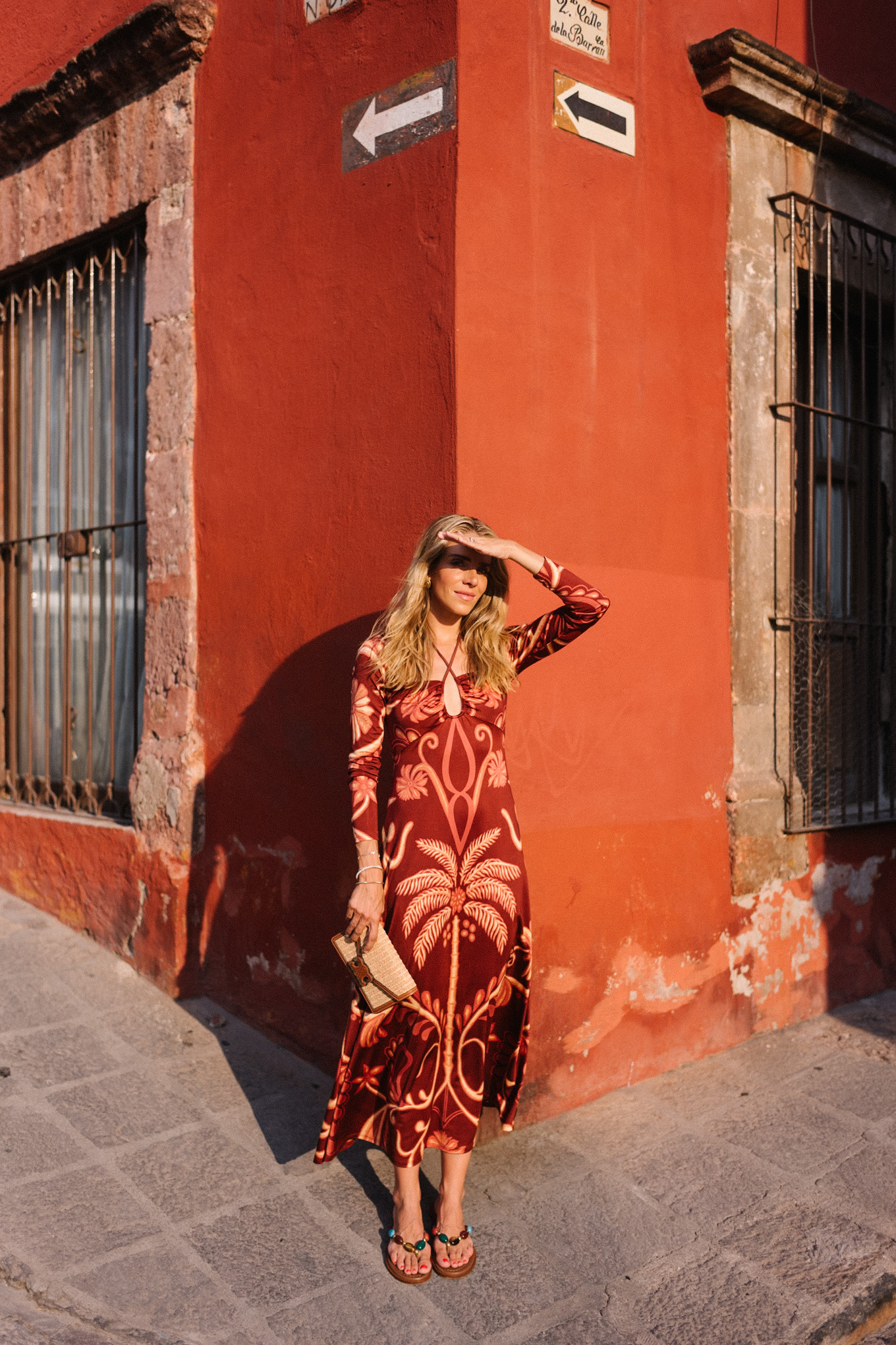 red tropical patterned long sleeved maxi dress