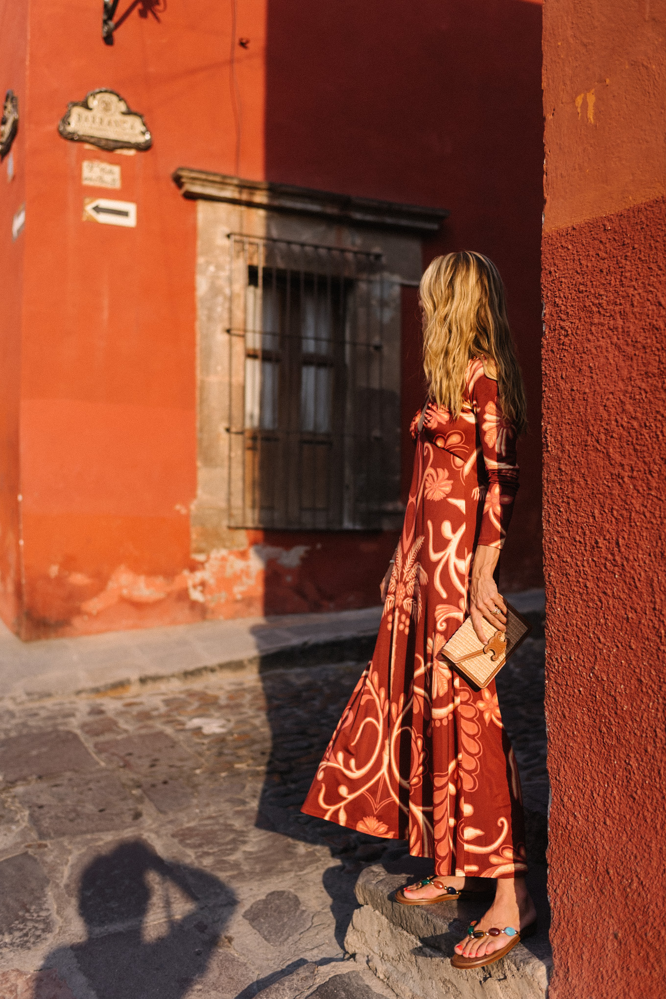 red tropical patterned long sleeved maxi dress