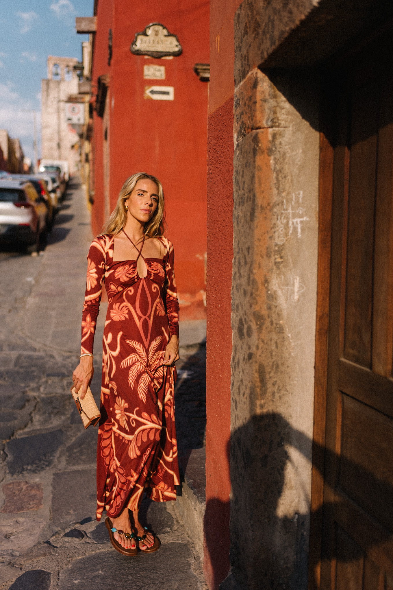 red tropical patterned long sleeved maxi dress