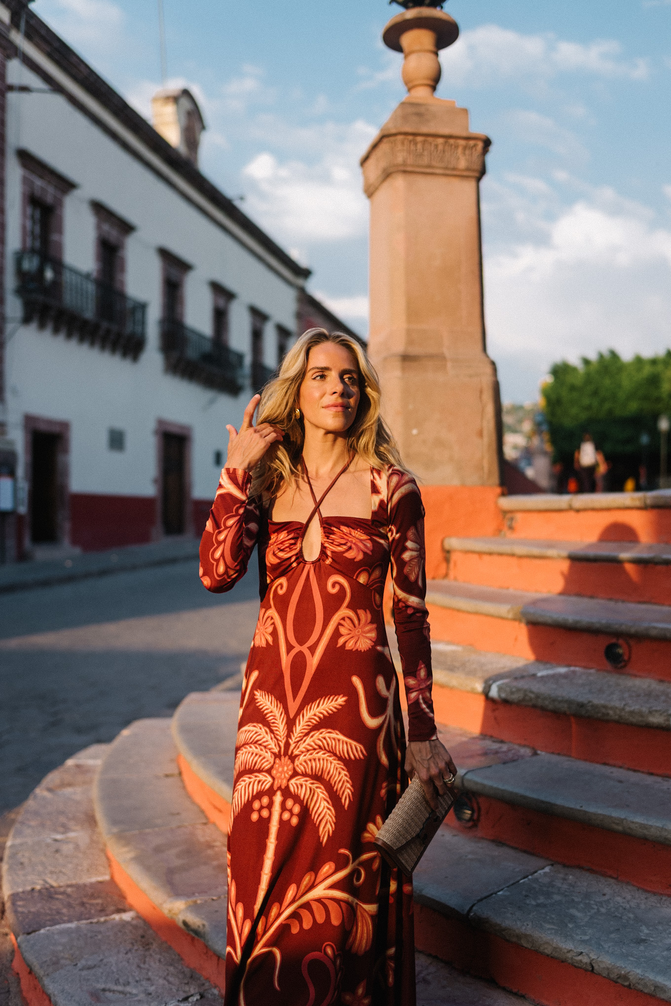 red tropical patterned long sleeved maxi dress
