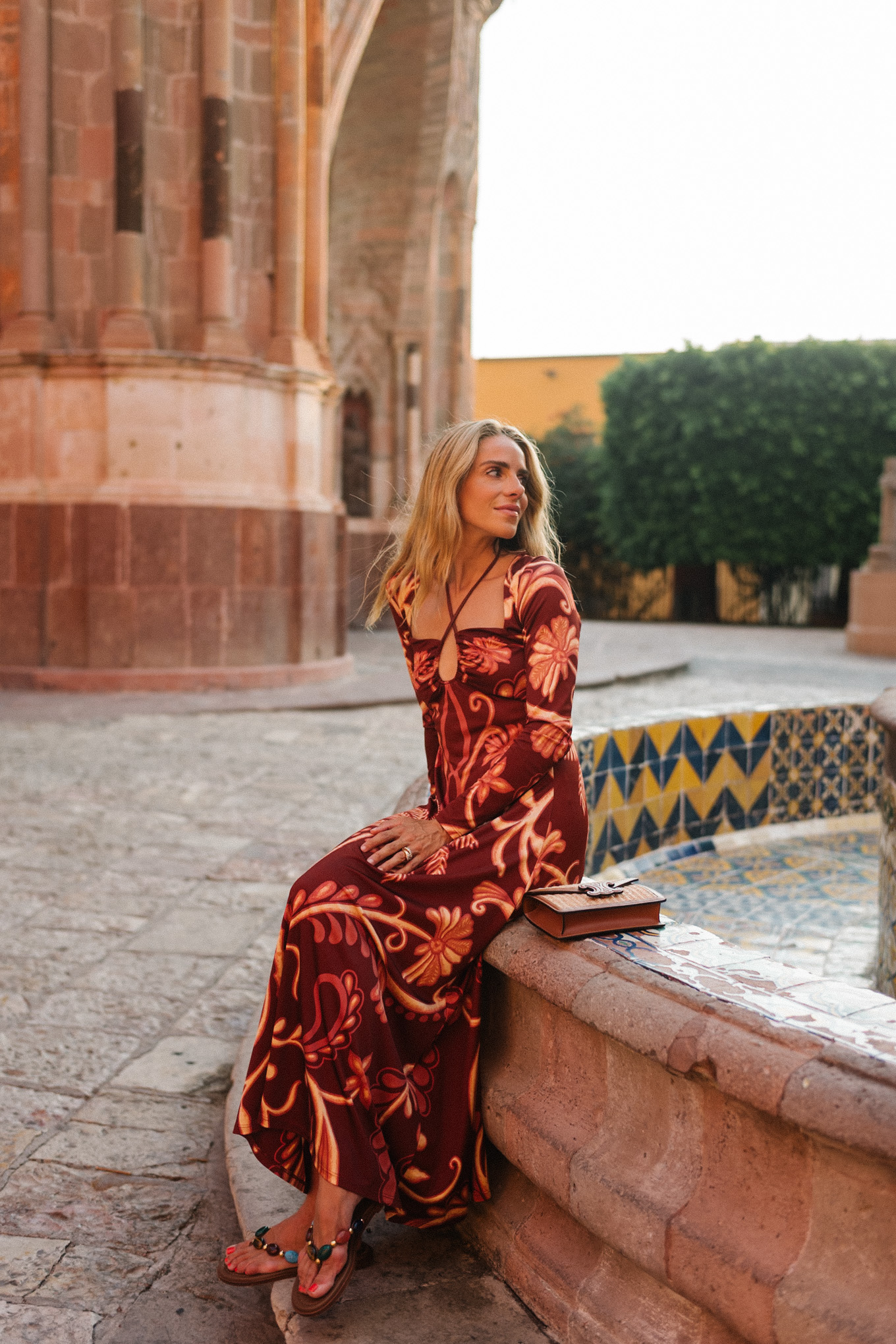 red tropical patterned long sleeved maxi dress
