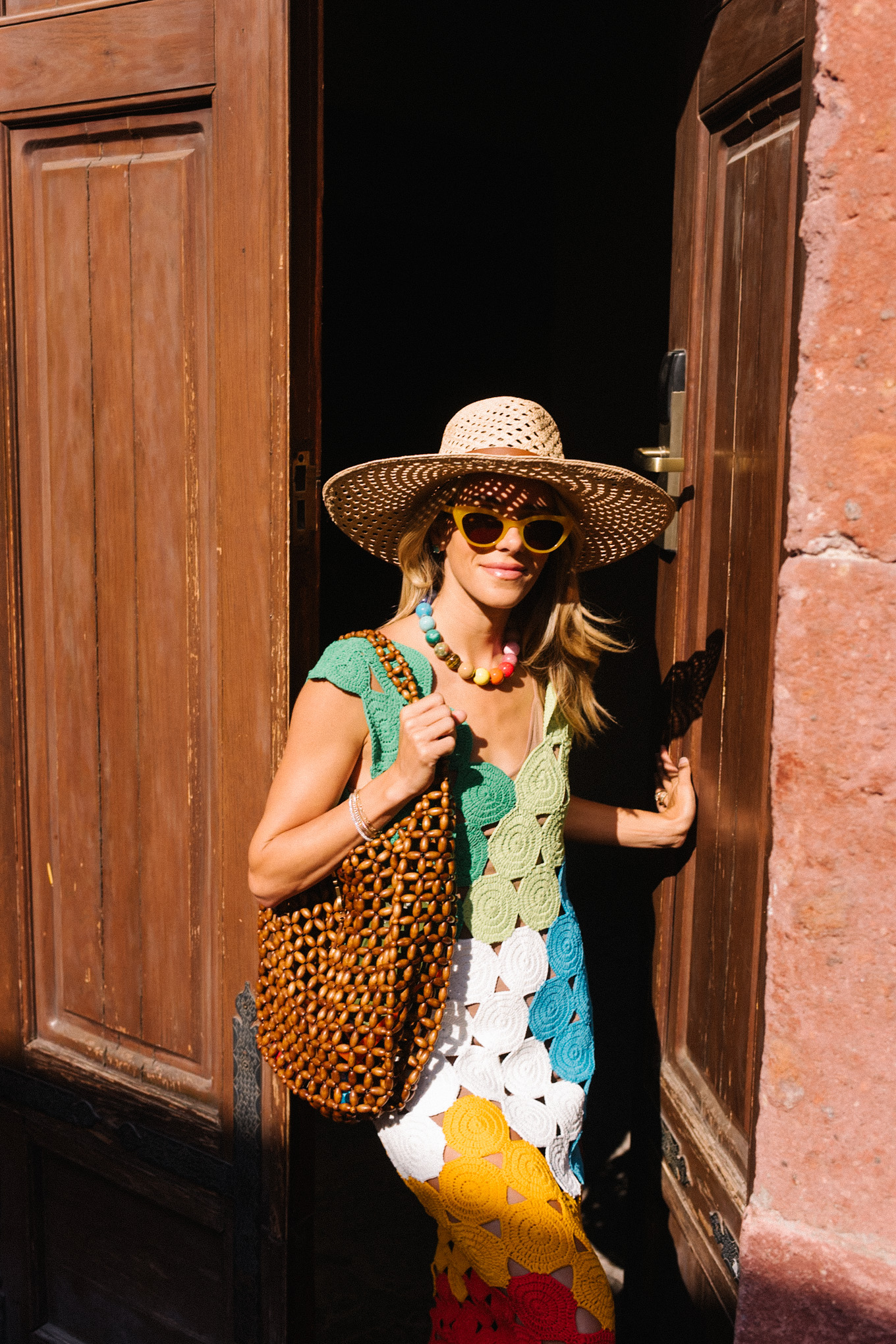 rainbow crochet midi dress brown strappy sandals woven bag straw hat summer accessories