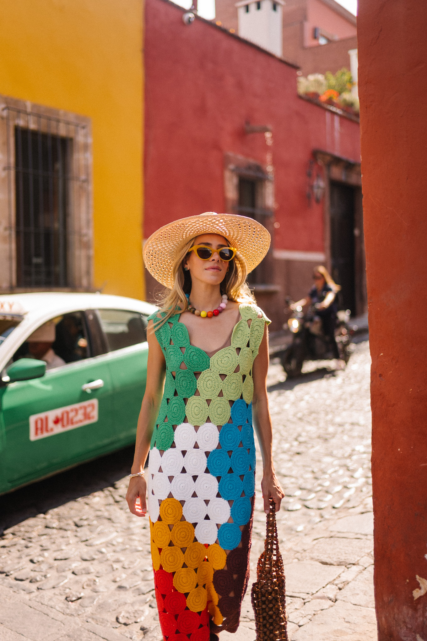 rainbow crochet midi dress brown strappy sandals woven bag straw hat summer accessories