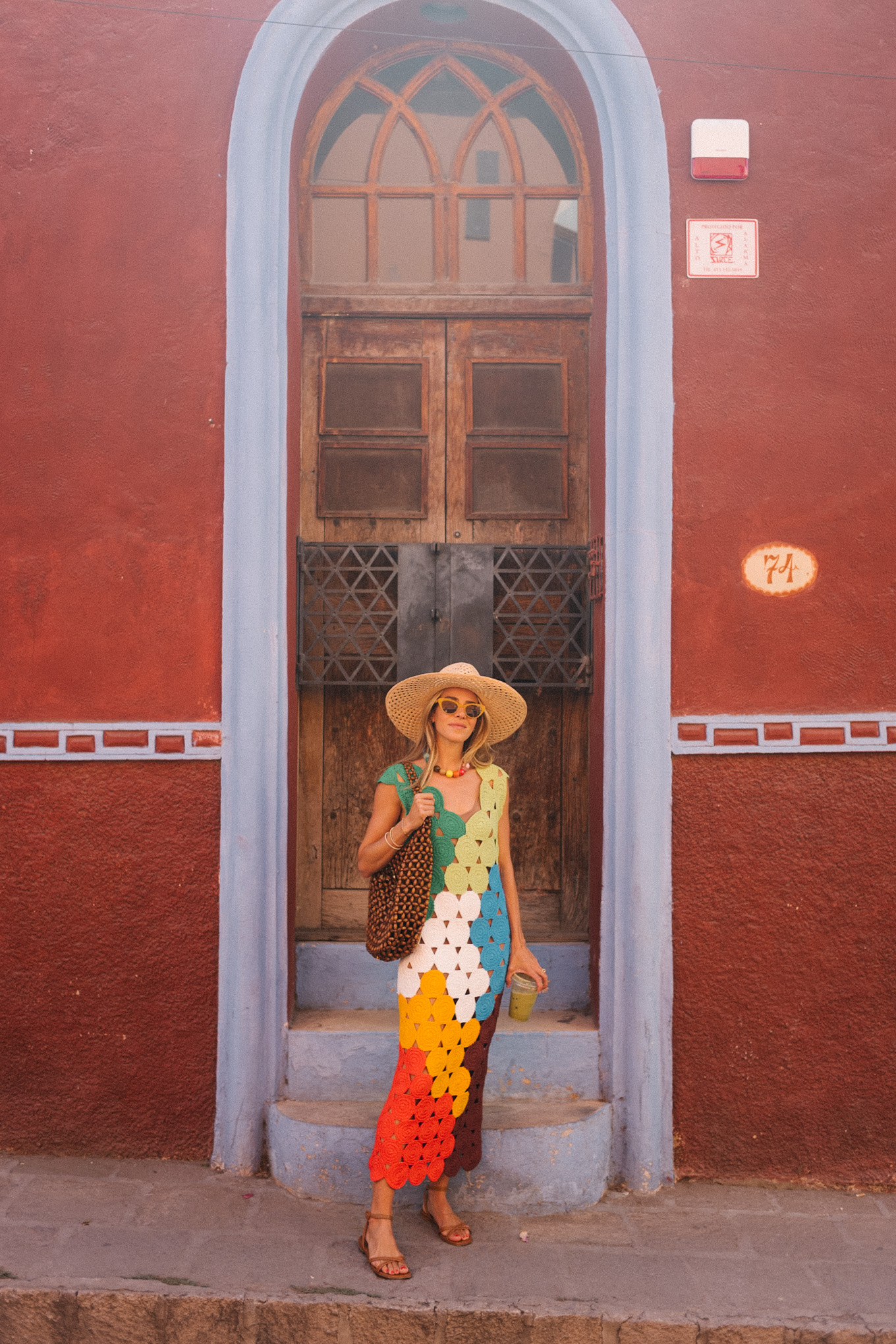 rainbow crochet midi dress brown strappy sandals woven bag straw hat summer accessories