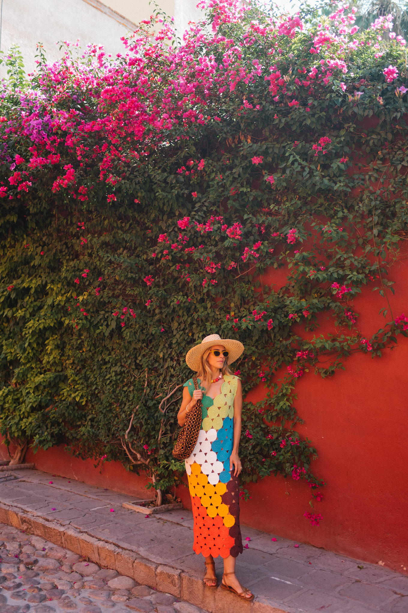 rainbow crochet midi dress brown strappy sandals woven bag straw hat summer accessories