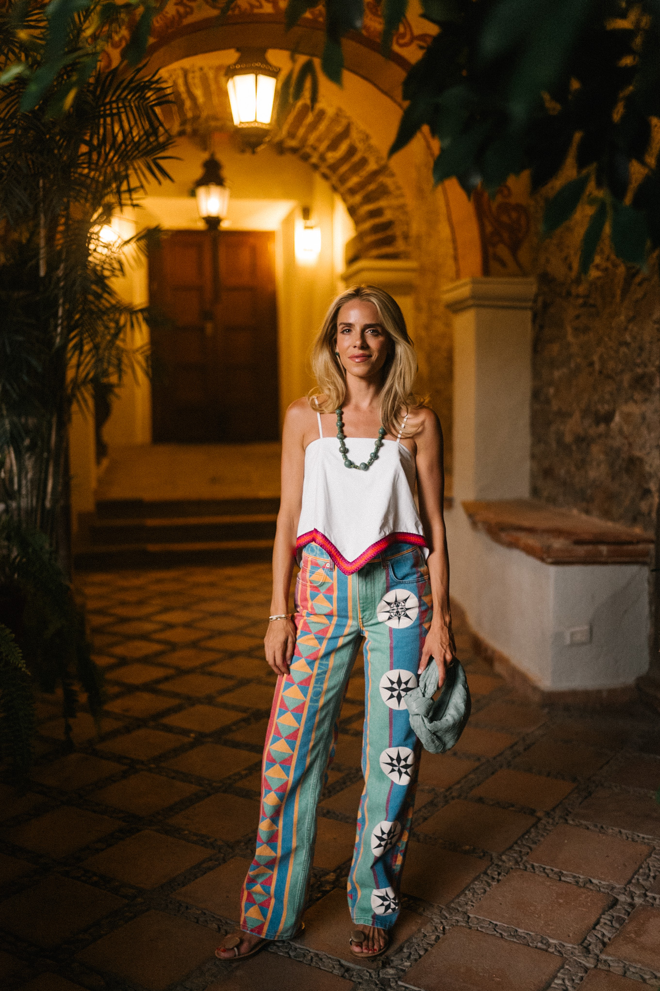 colorful printed jeans white tank beaded necklace