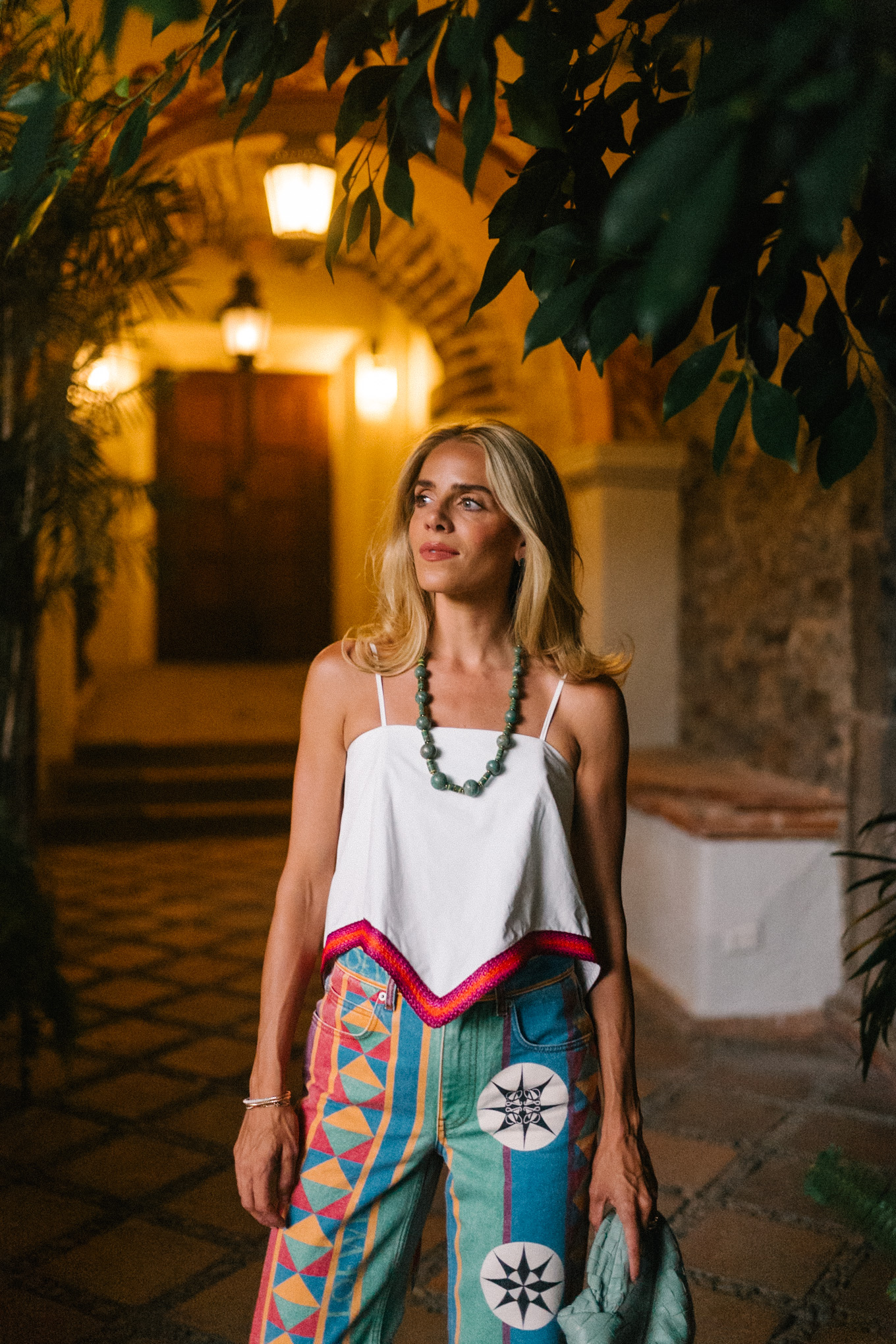 colorful printed jeans white tank beaded necklace