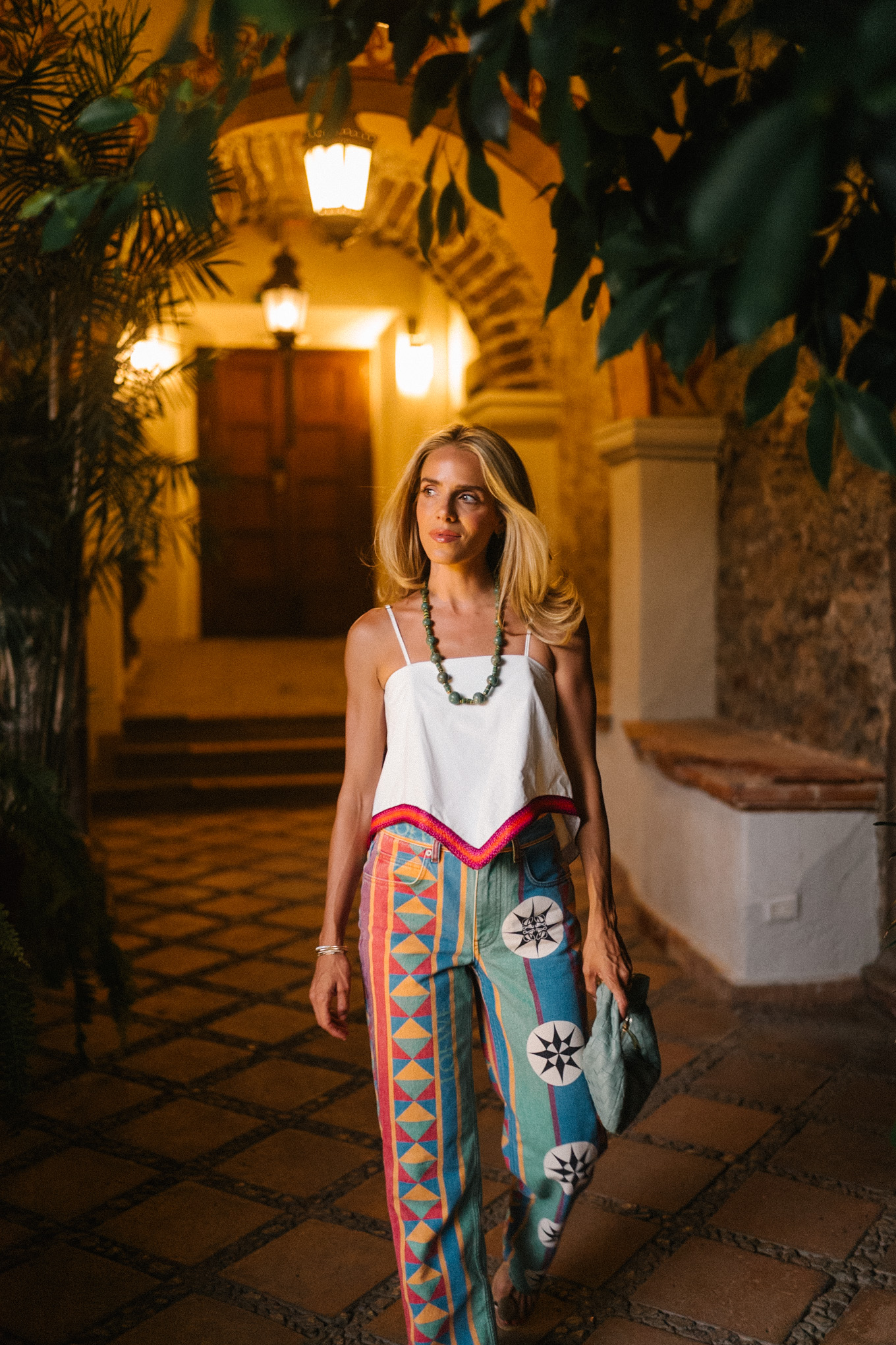 colorful printed jeans white tank beaded necklace