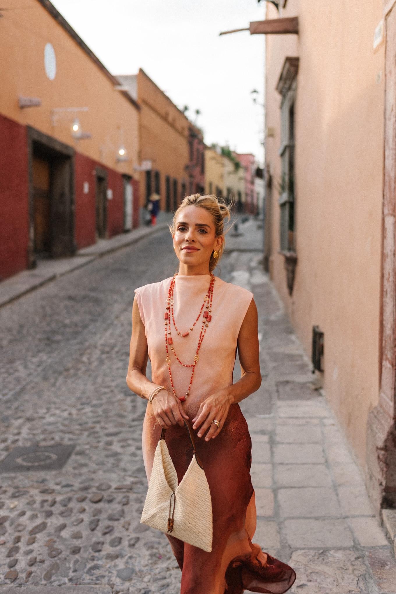 peach burnt orange ombre maxi dress orange jewels rattan handbag