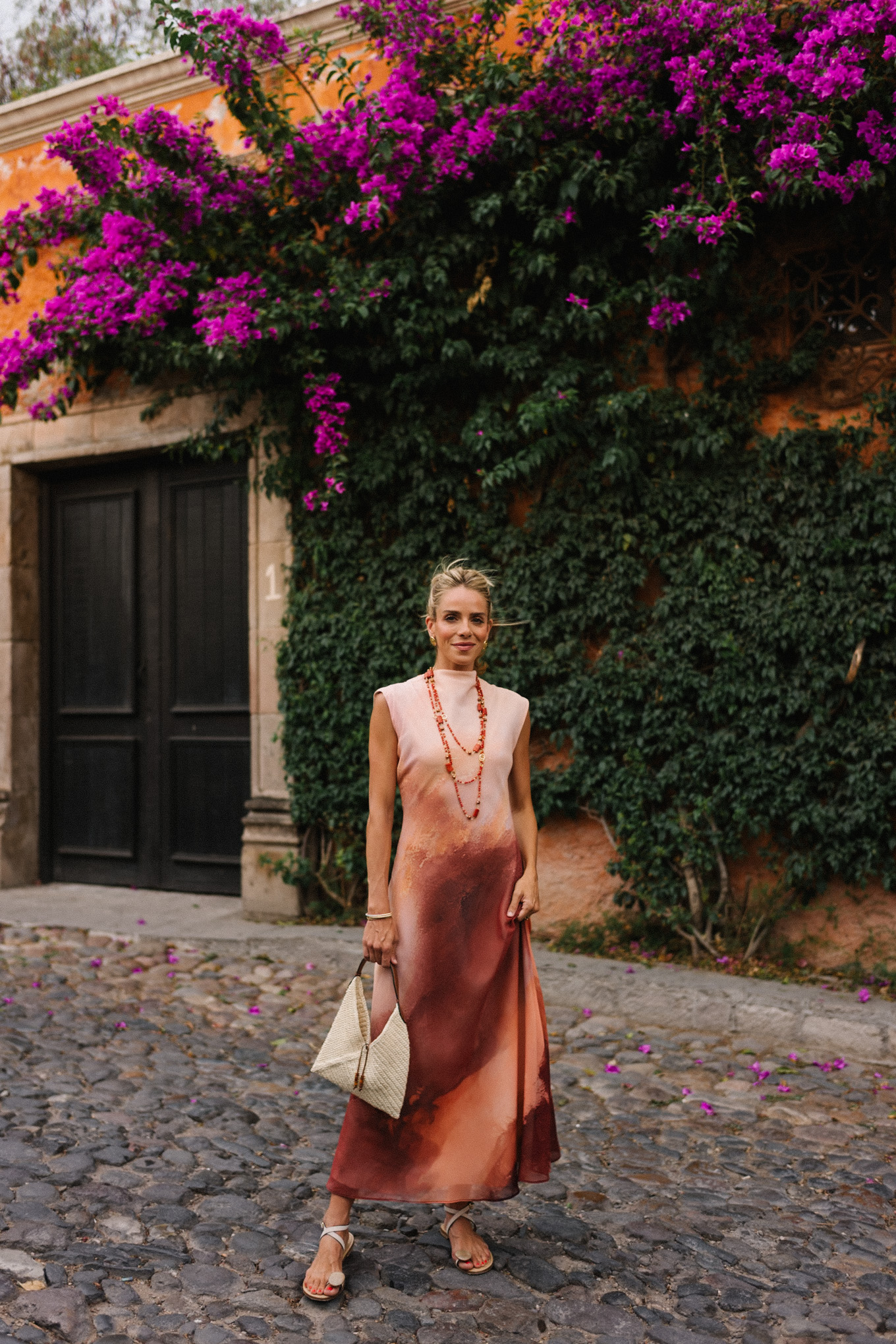 peach burnt orange ombre maxi dress orange jewels rattan handbag