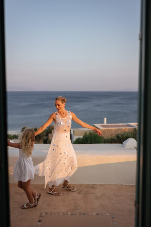 white sheer sequin tunic top blue mesh bra white maxi skirt white leather sandals
