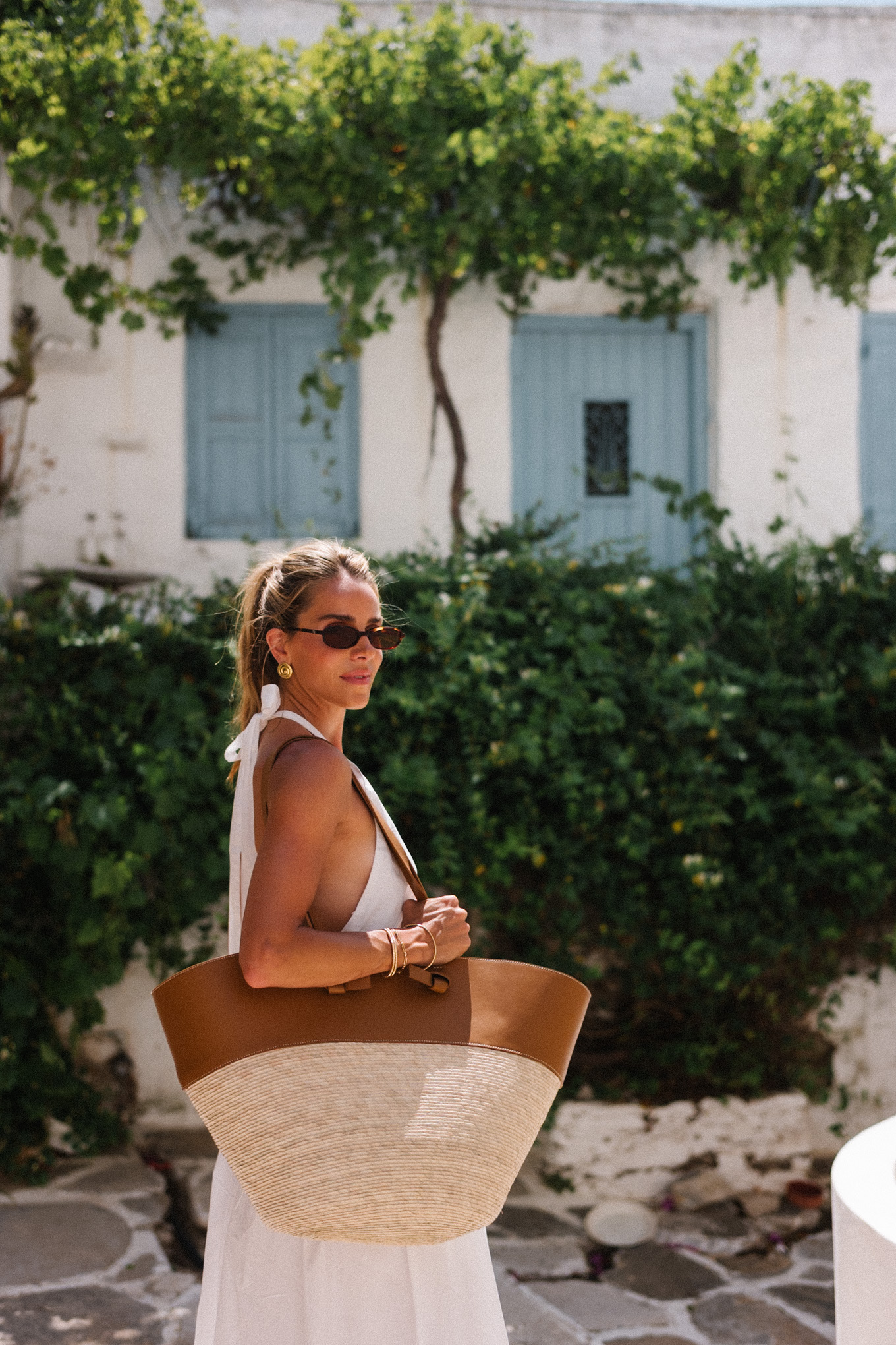 white halter sundress straw and leather tote