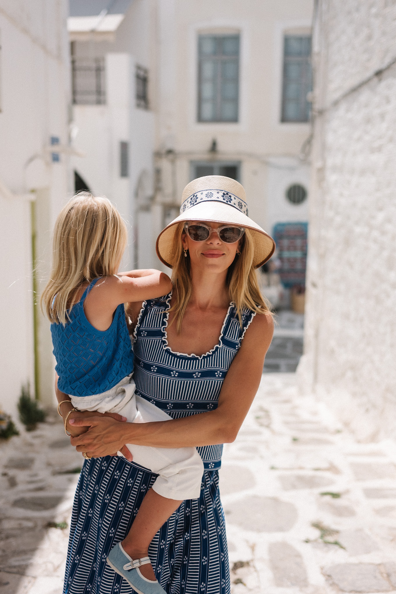 blue white jacquard tank and skirt set raffia bucket hat raffia tote white strappy sandals
