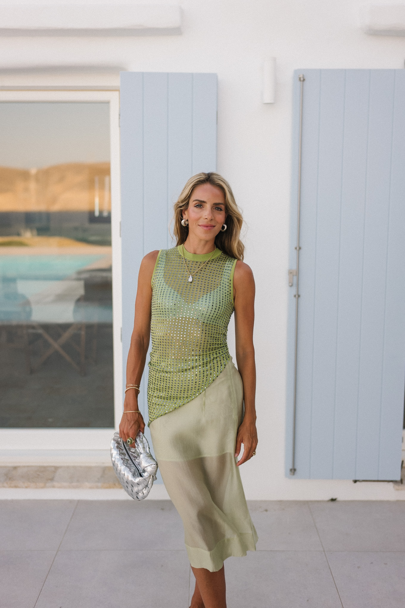 green sheer asymmetrical top green sheer midi skirt white strappy heels