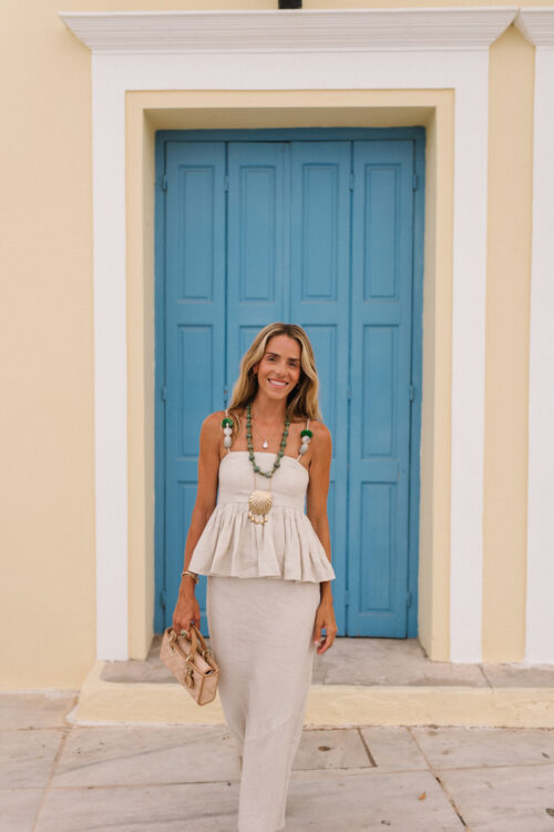 tan linen skirt set green beaded necklace green sandals raffia bag