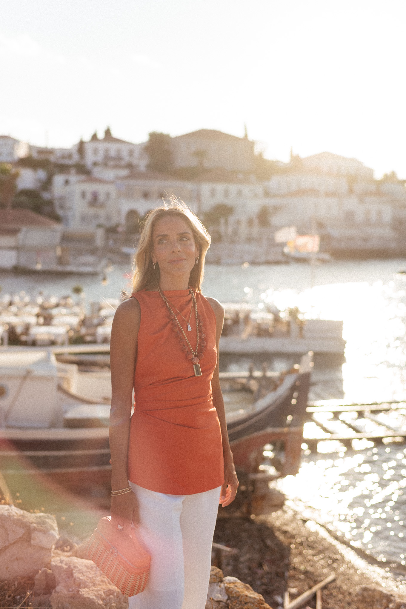 orange linen top white linen pants raffia heels orange basket bag layered necklaces