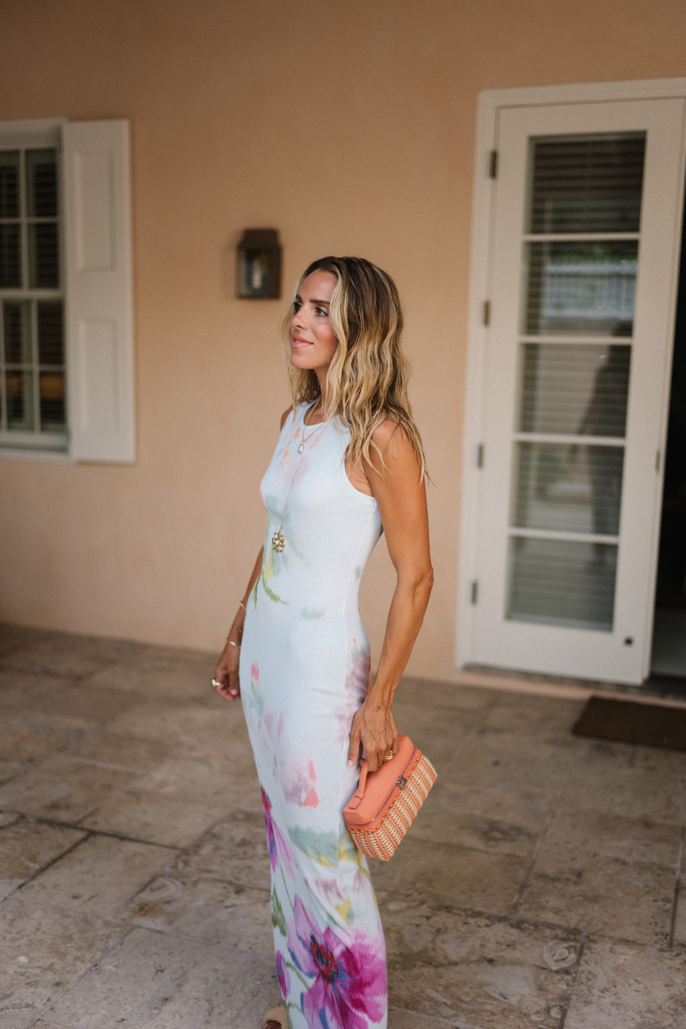 white floral jersey midi dress orange raffia handbag raffia heels