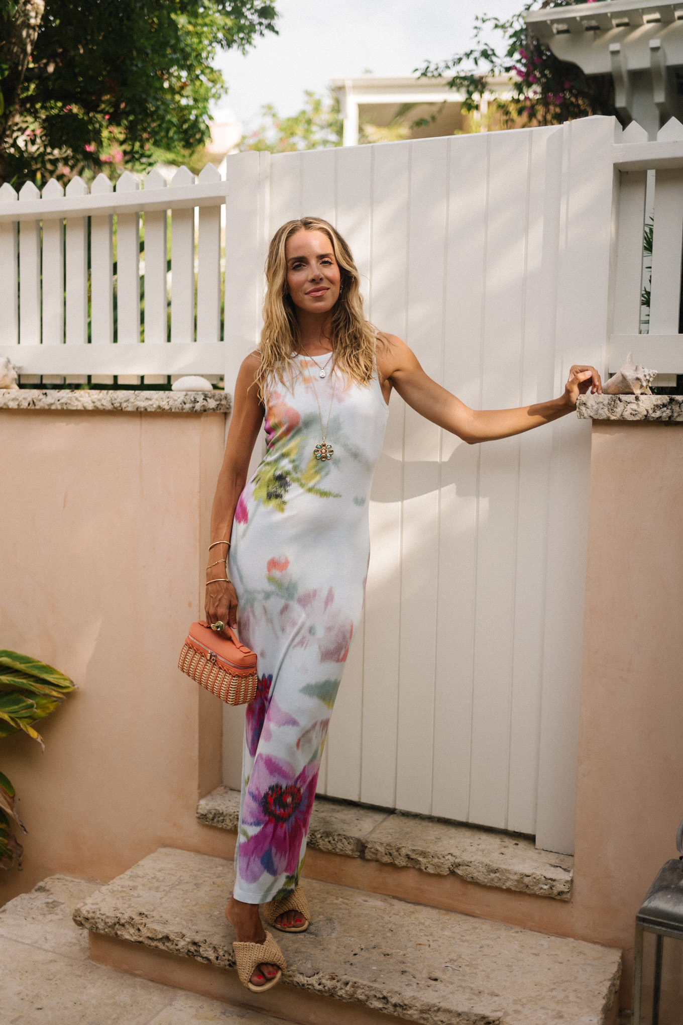 white floral jersey midi dress orange raffia handbag raffia heels