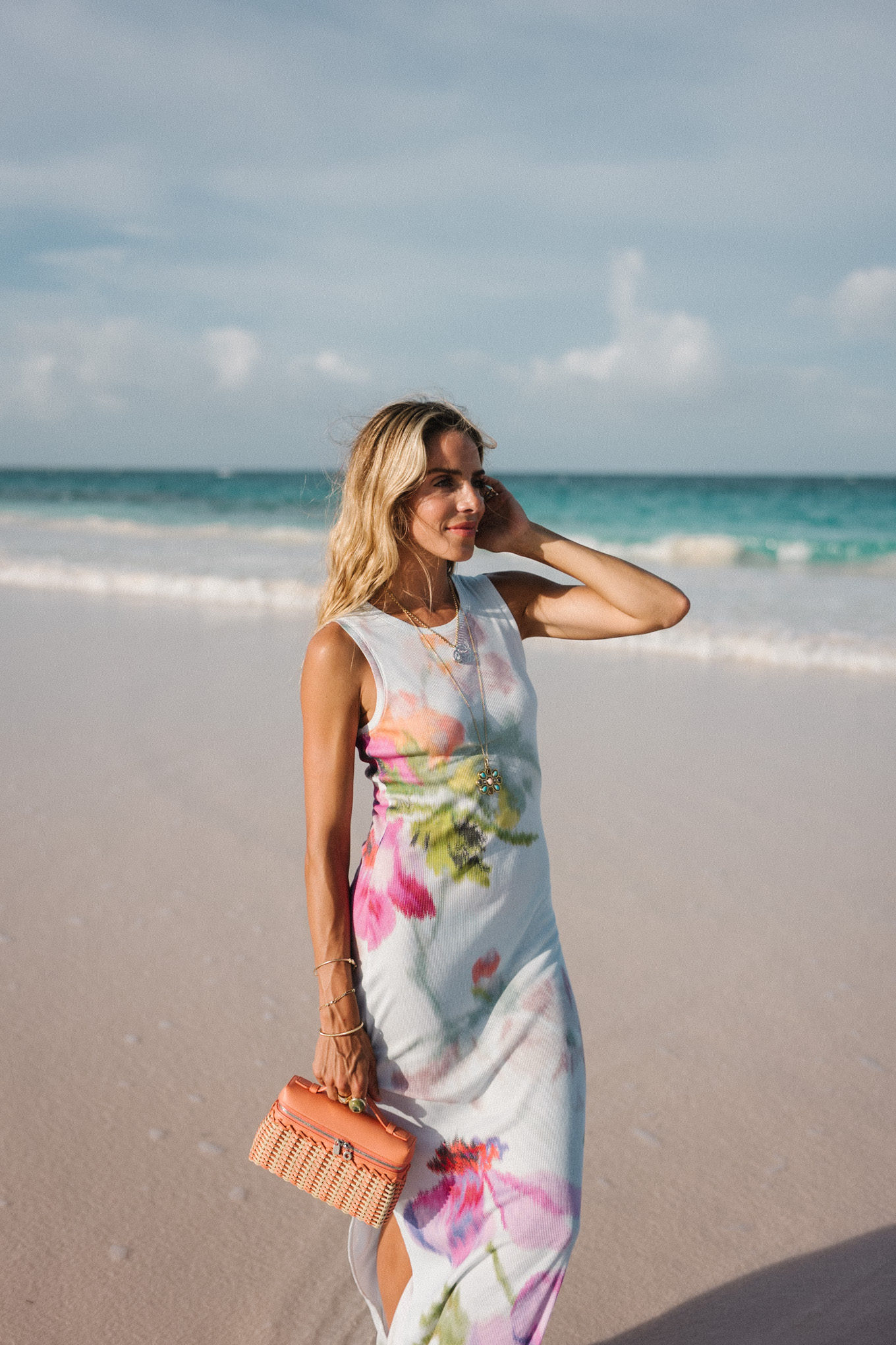 white floral jersey midi dress orange raffia handbag