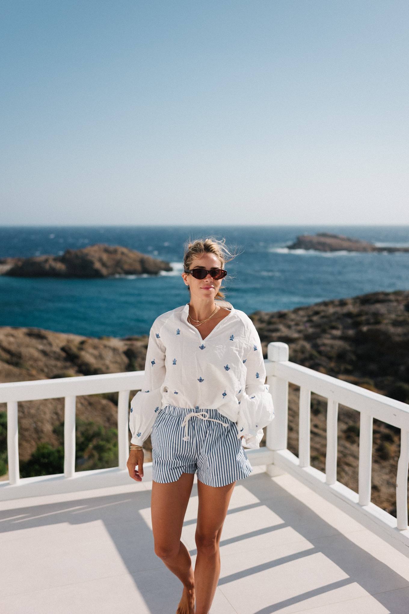 White embroidered cotton blouse blue white white shorts