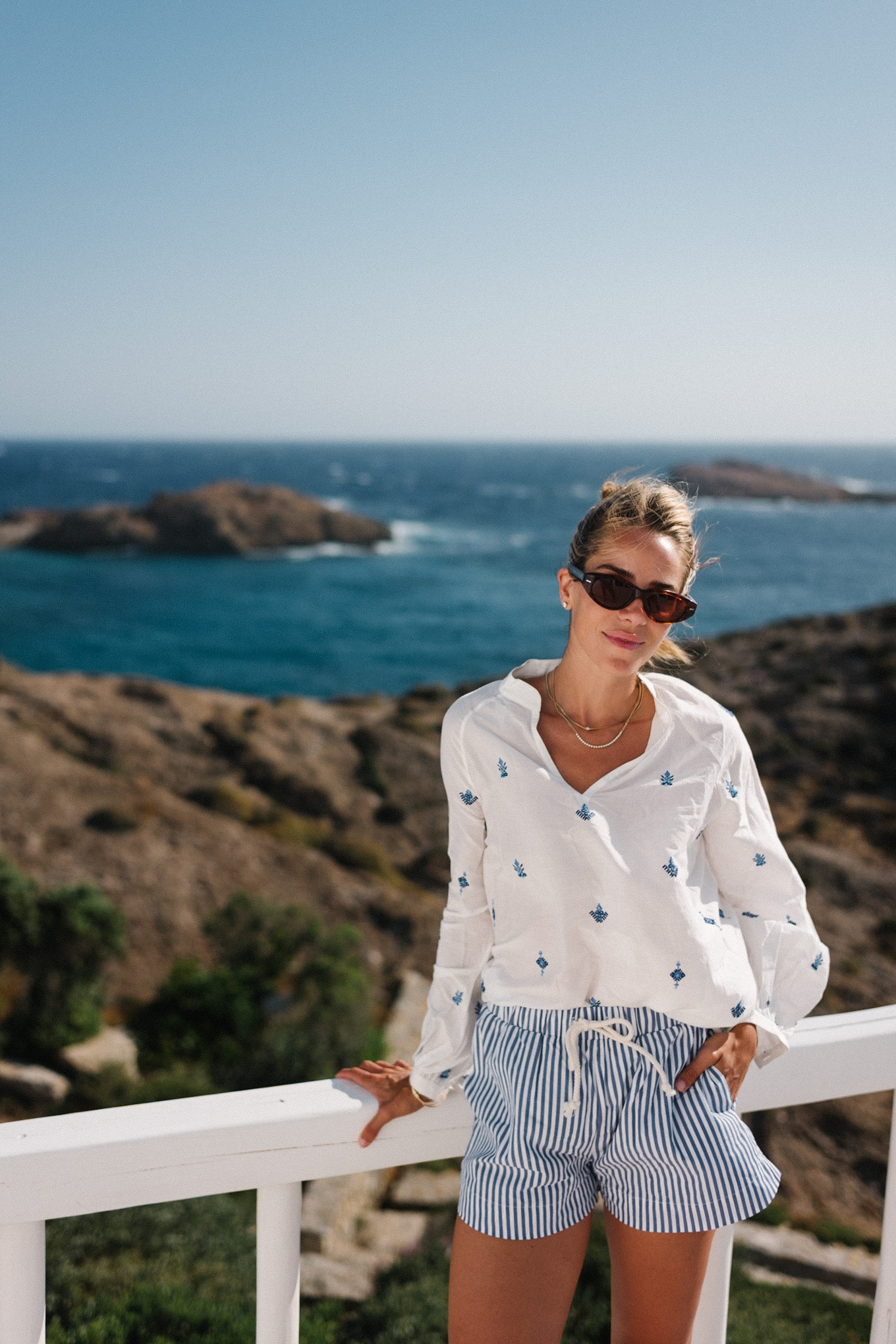 White embroidered cotton blouse blue white white shorts
