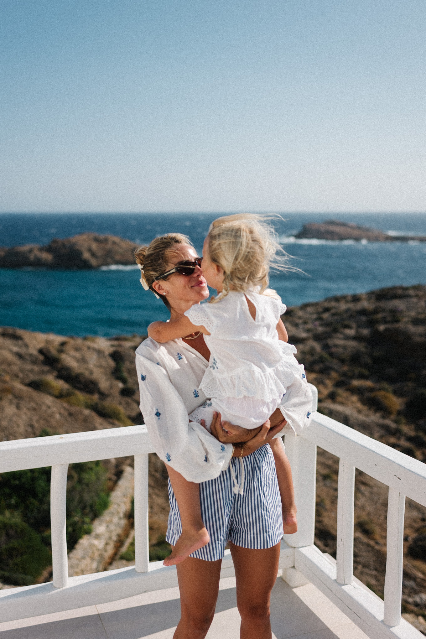 White embroidered cotton blouse blue white white shorts