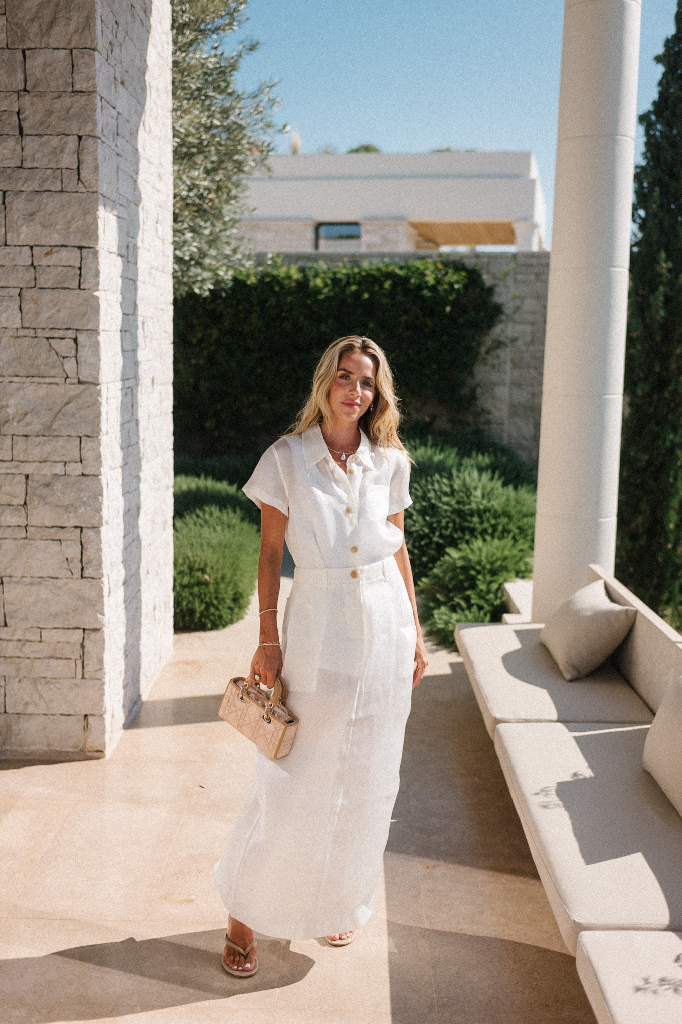 white button down top white sheer maxi skirt rattan handbag rattan heeled flip flops