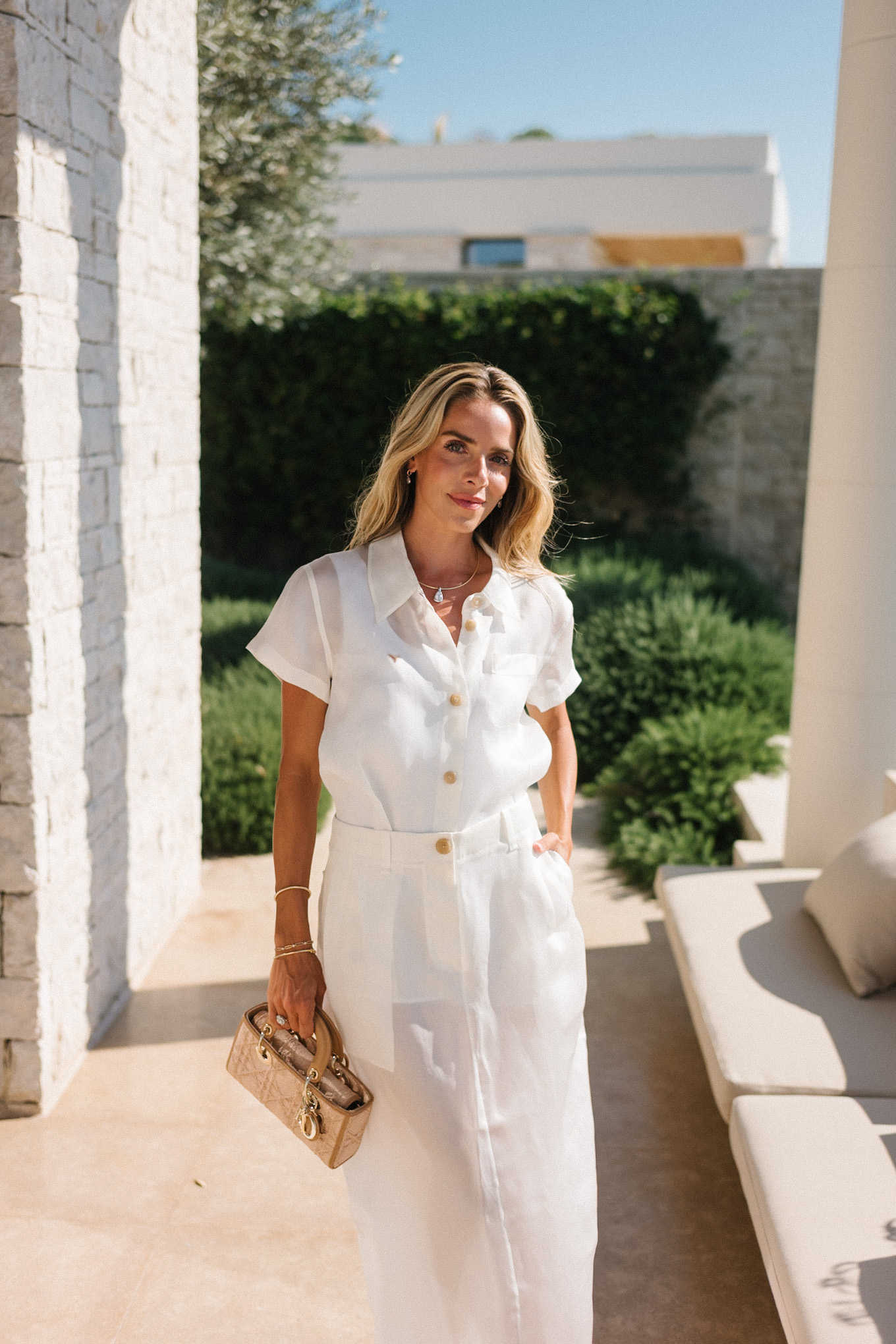 white button down top white sheer maxi skirt rattan handbag rattan heeled flip flops