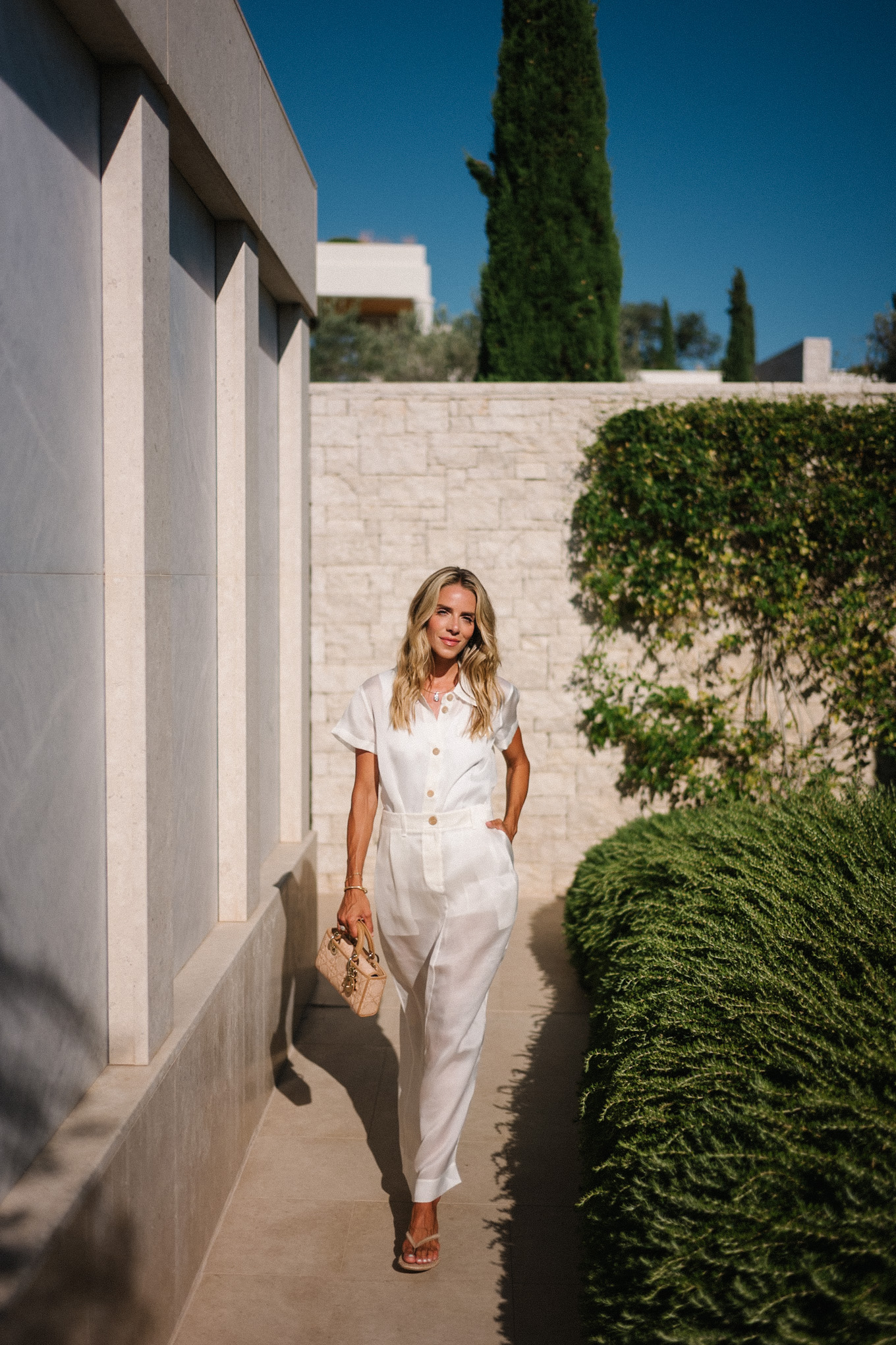 white button down top white sheer maxi skirt rattan handbag rattan heeled flip flops