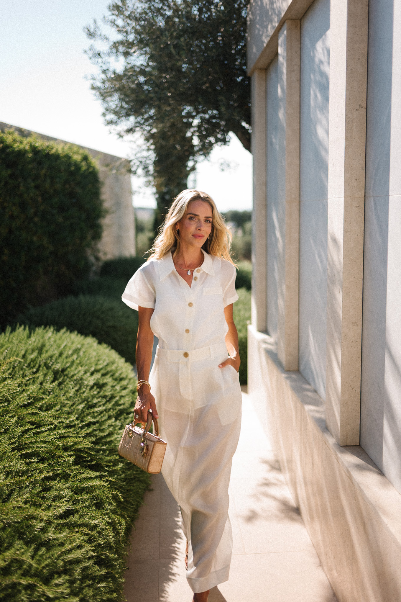 white button down top white sheer maxi skirt rattan handbag rattan heeled flip flops