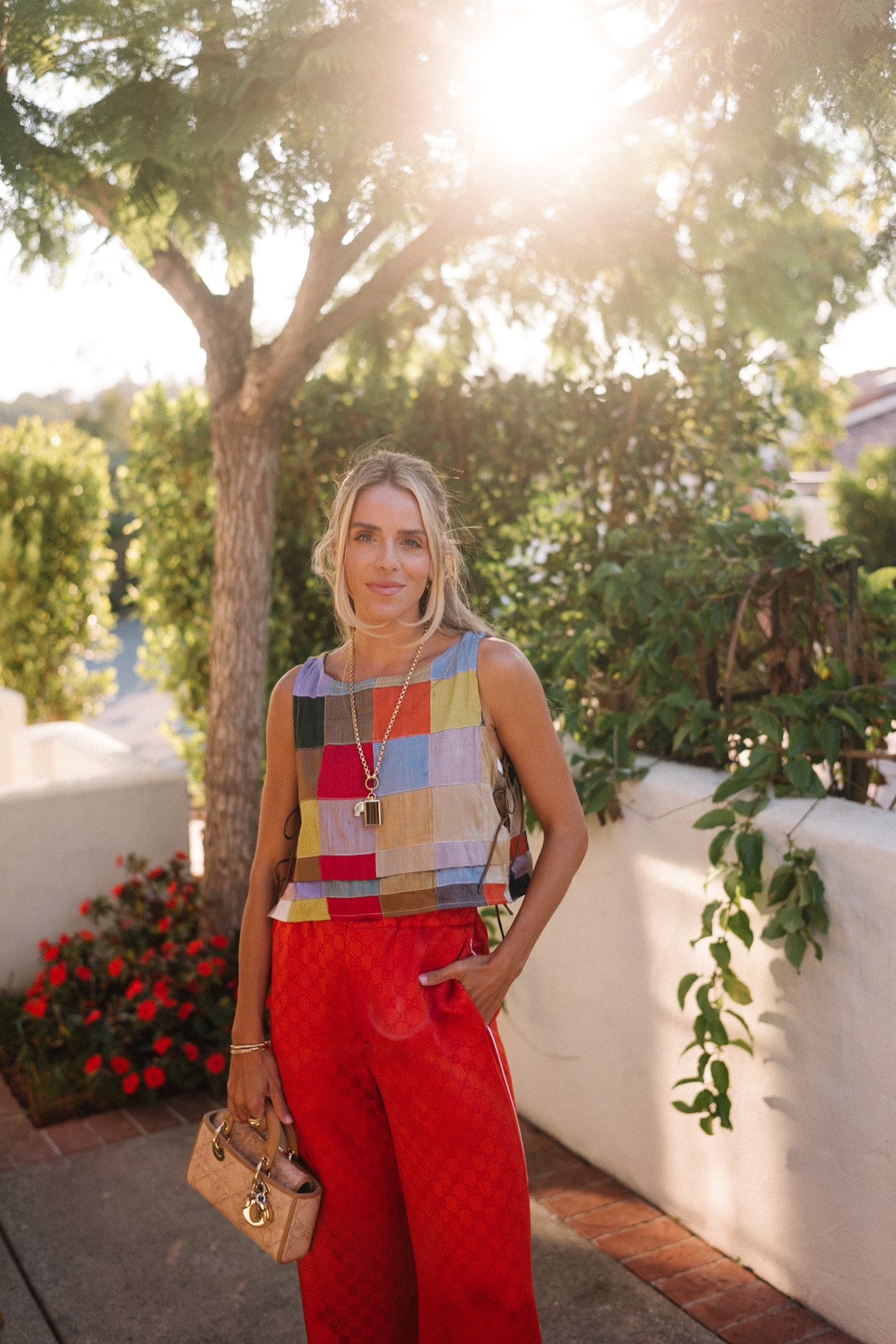 rainbow color block tank red silk pants rattan bag rattan heels