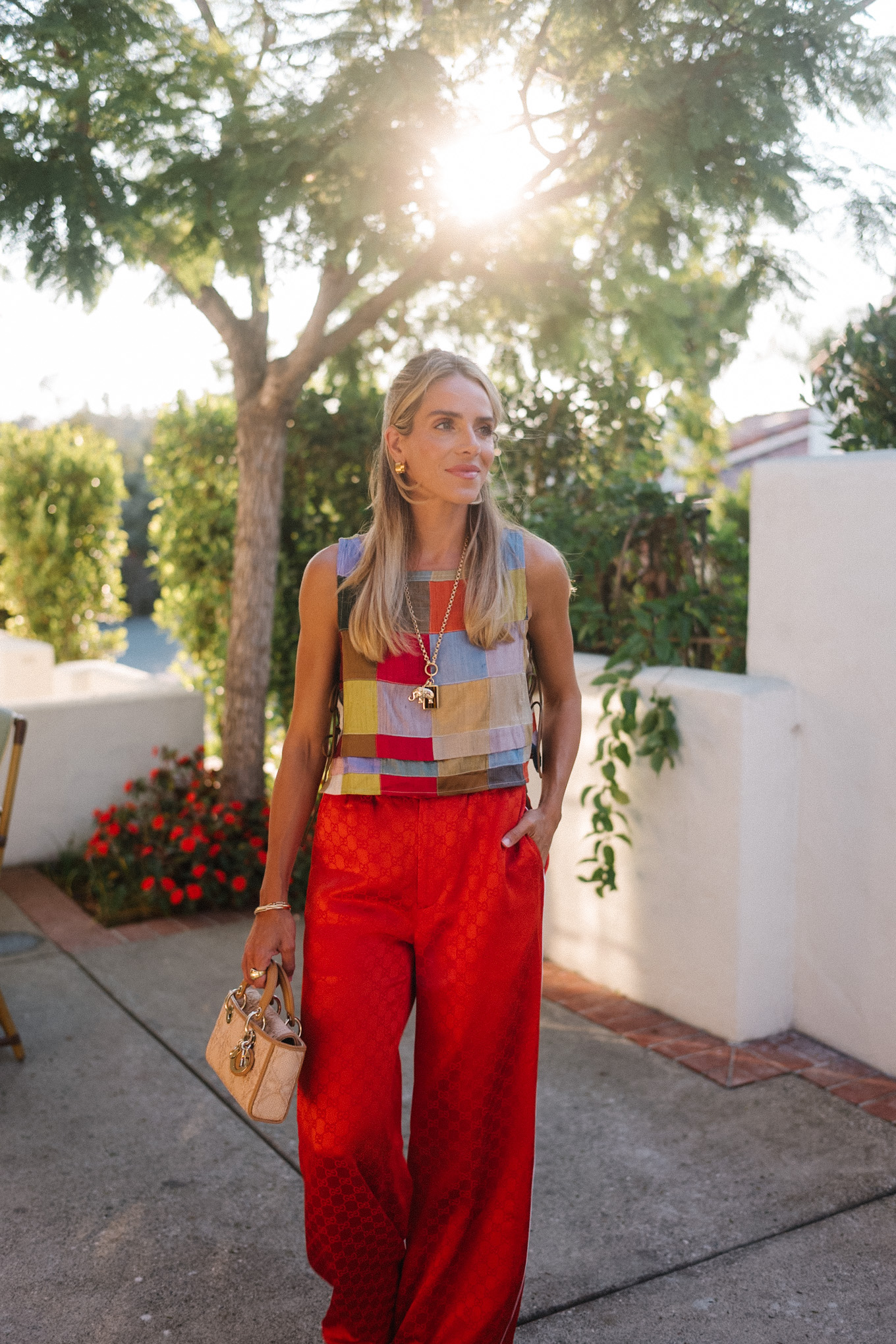 rainbow color block tank red silk pants rattan bag rattan heels