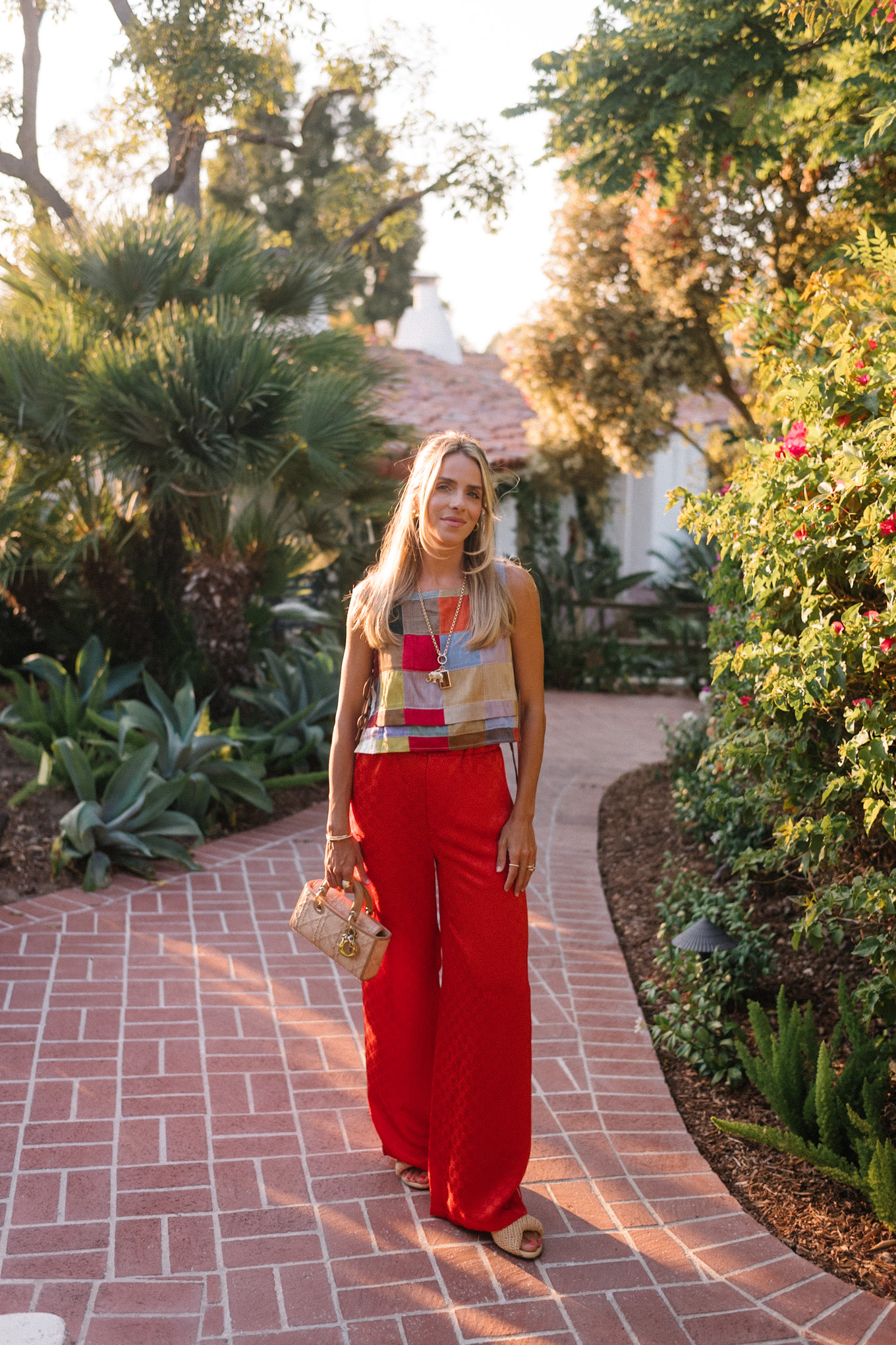 rainbow color block tank red silk pants rattan bag rattan heels