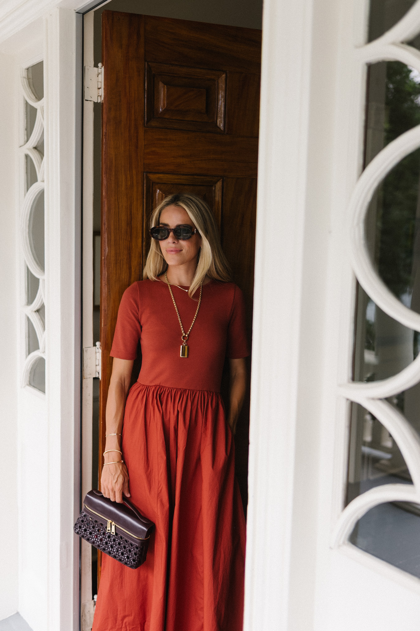 rust midi shirtdress brown leather and rattan bag brown sunnies brown heels