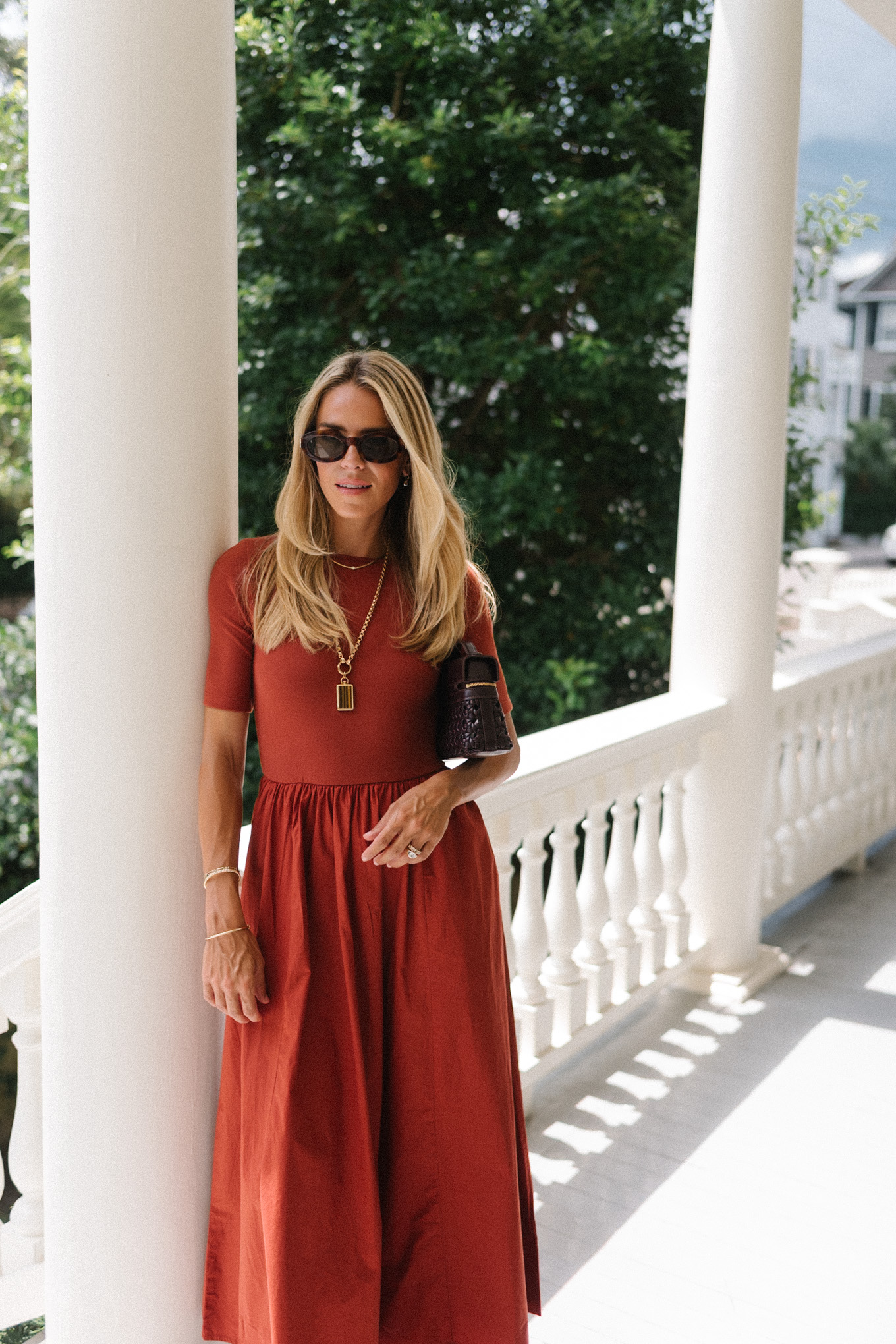rust midi shirtdress brown leather and rattan bag brown sunnies brown heels