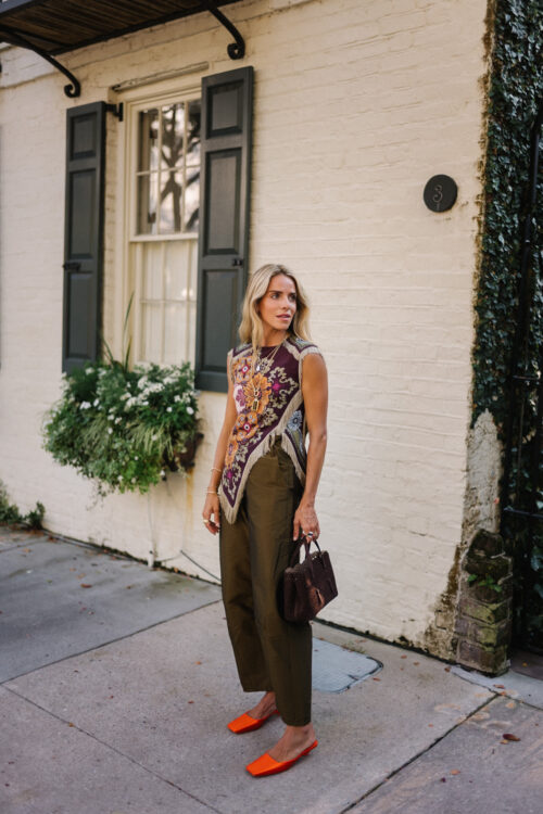 purple floral scarf top brown satin pants brown handbag orange mules