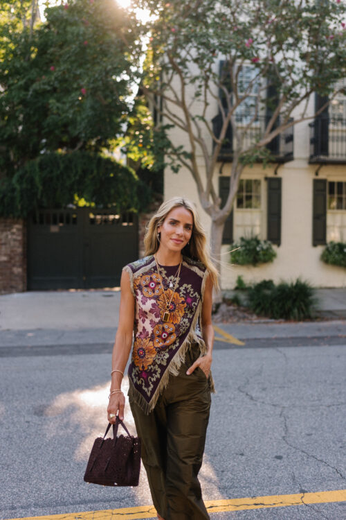 purple floral scarf top brown satin pants brown handbag orange mules