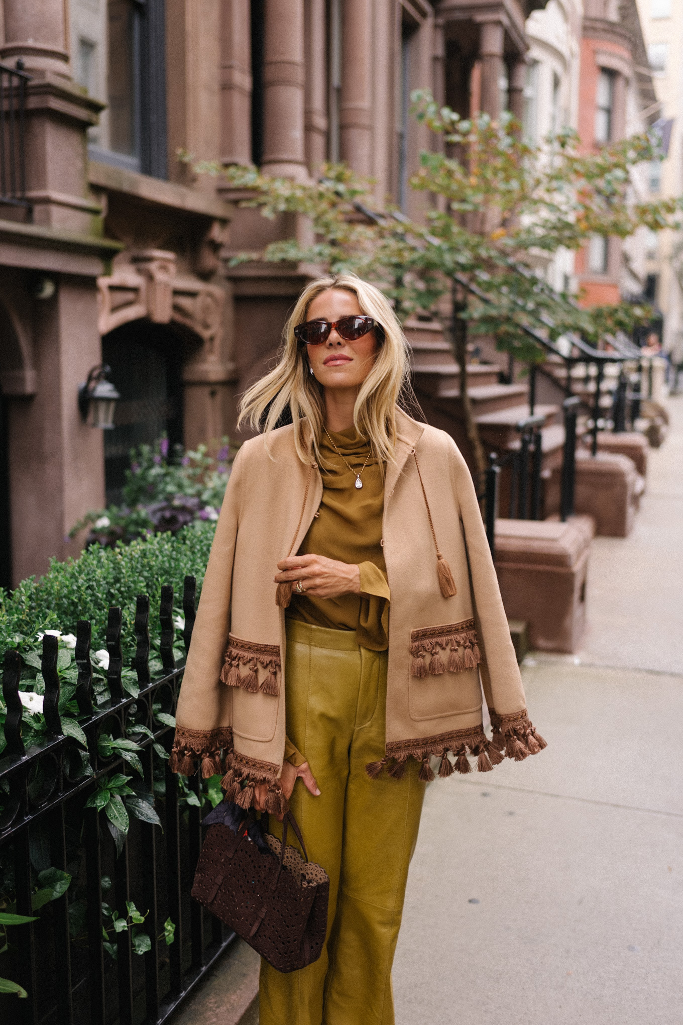 gold silk blouse gold leather pants tan suede coat