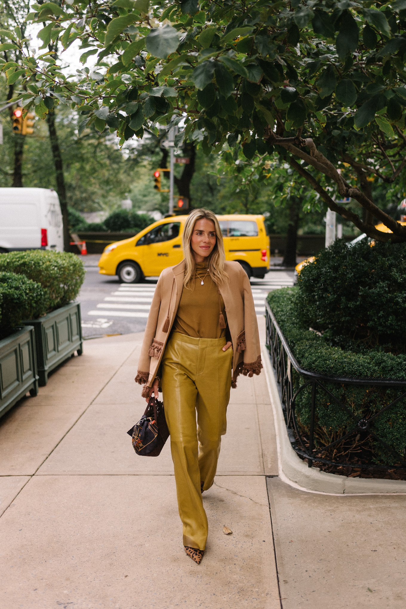 gold silk blouse gold leather pants tan suede coat