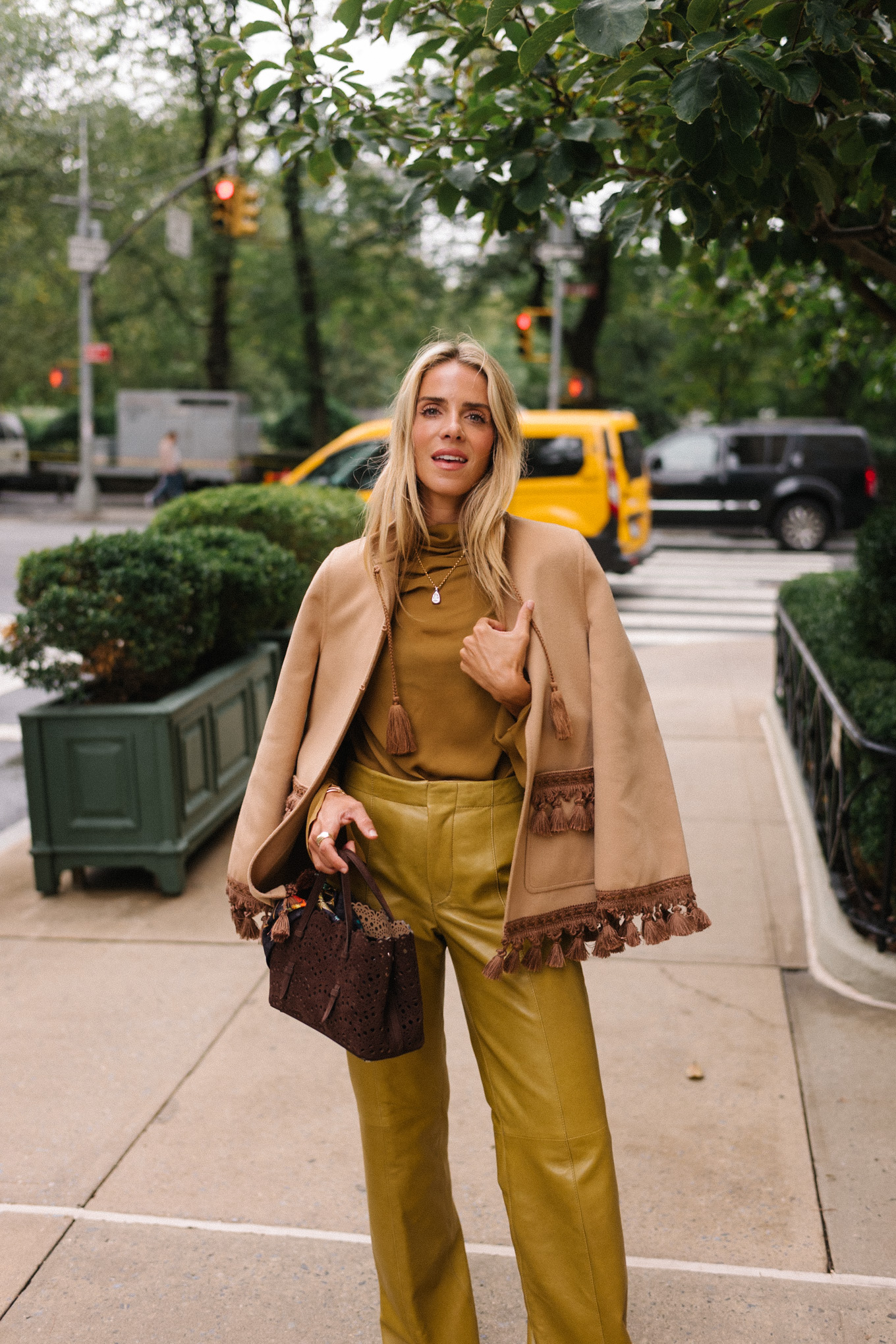 gold silk blouse gold leather pants tan suede coat