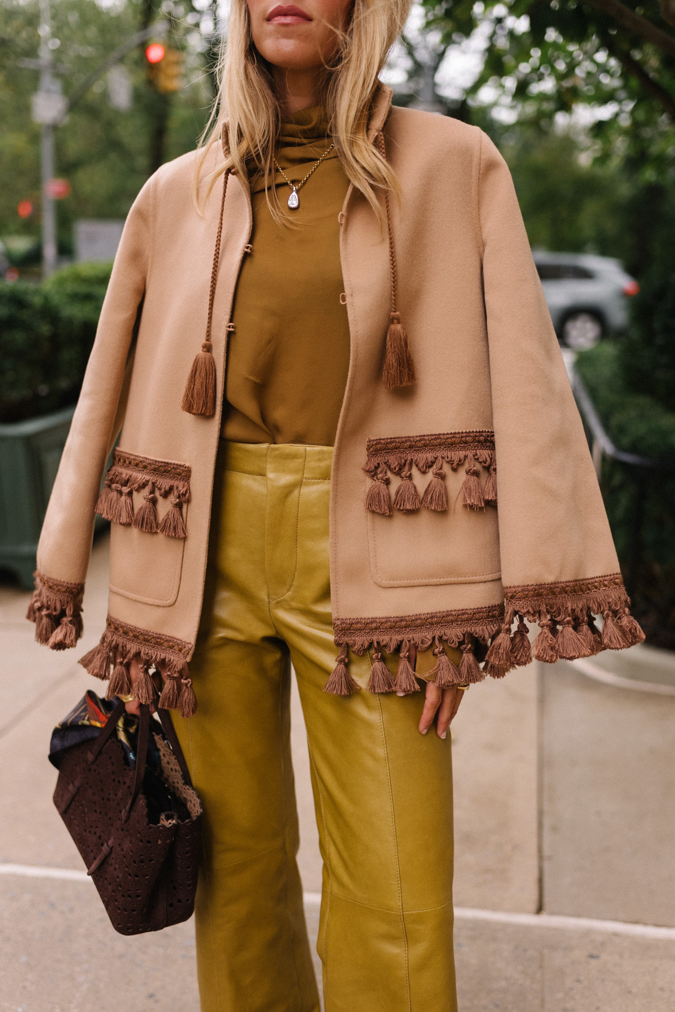 gold silk blouse gold leather pants tan suede coat