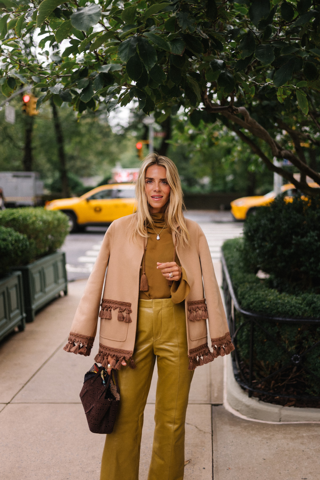 gold silk blouse gold leather pants tan suede coat