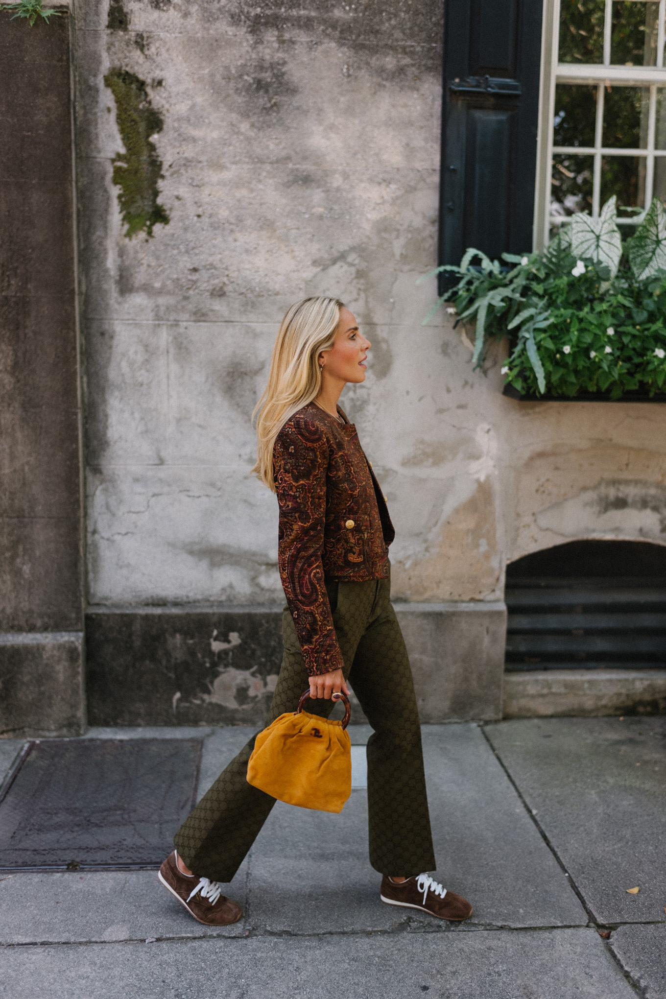 brown paisley jacket brown tank moss green pants brown suede sneakers gold suede bag