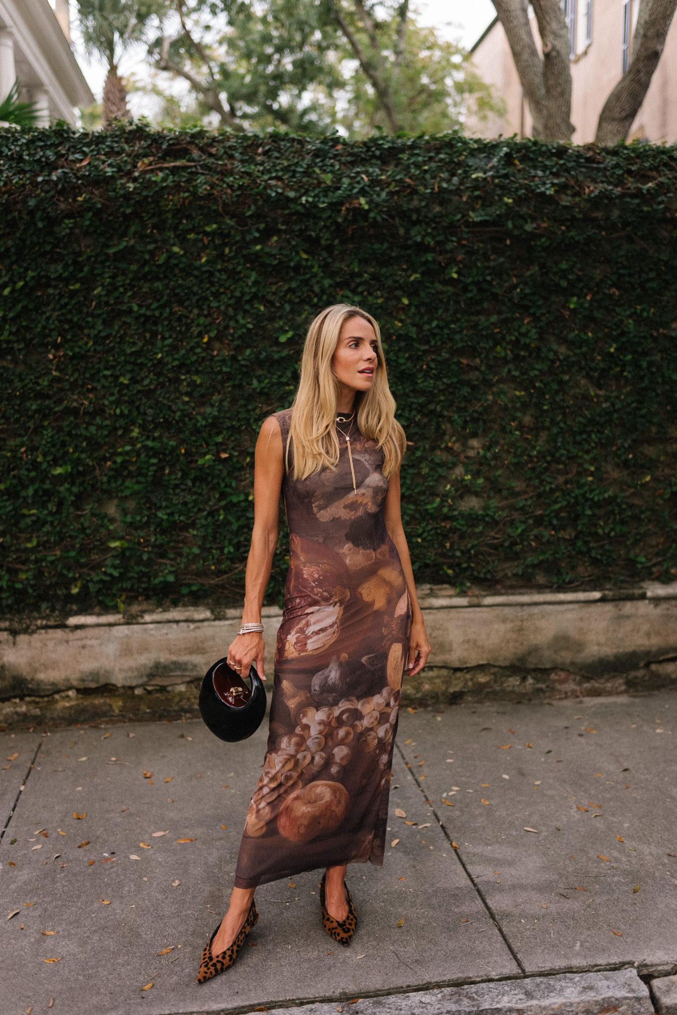 brown graphic fall dress black handbag timeless jewelry