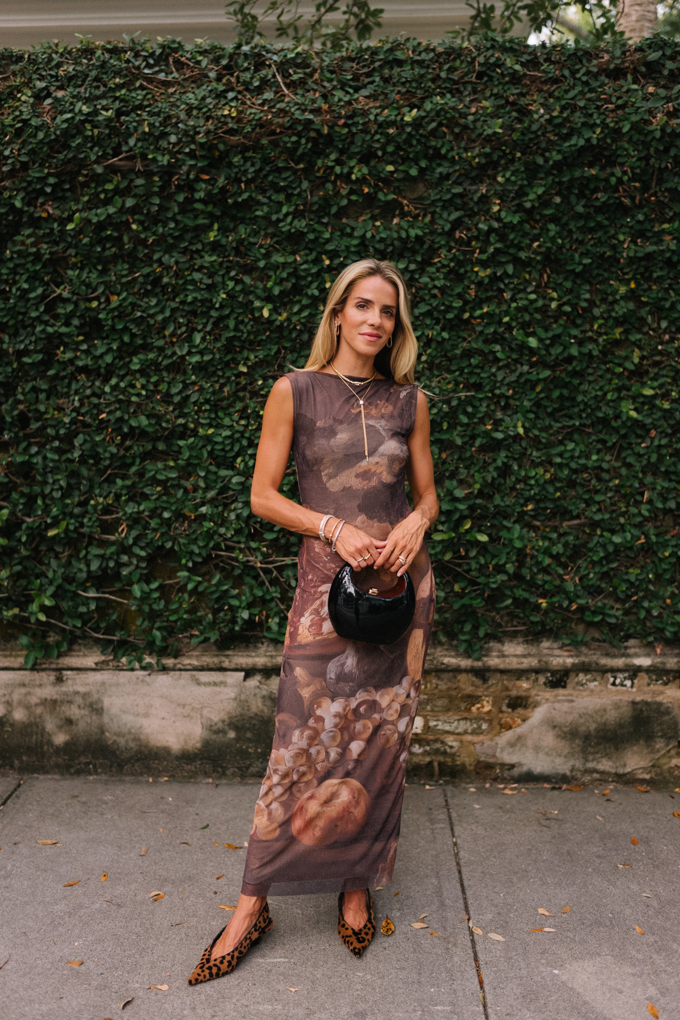 brown graphic fall dress black handbag timeless jewelry