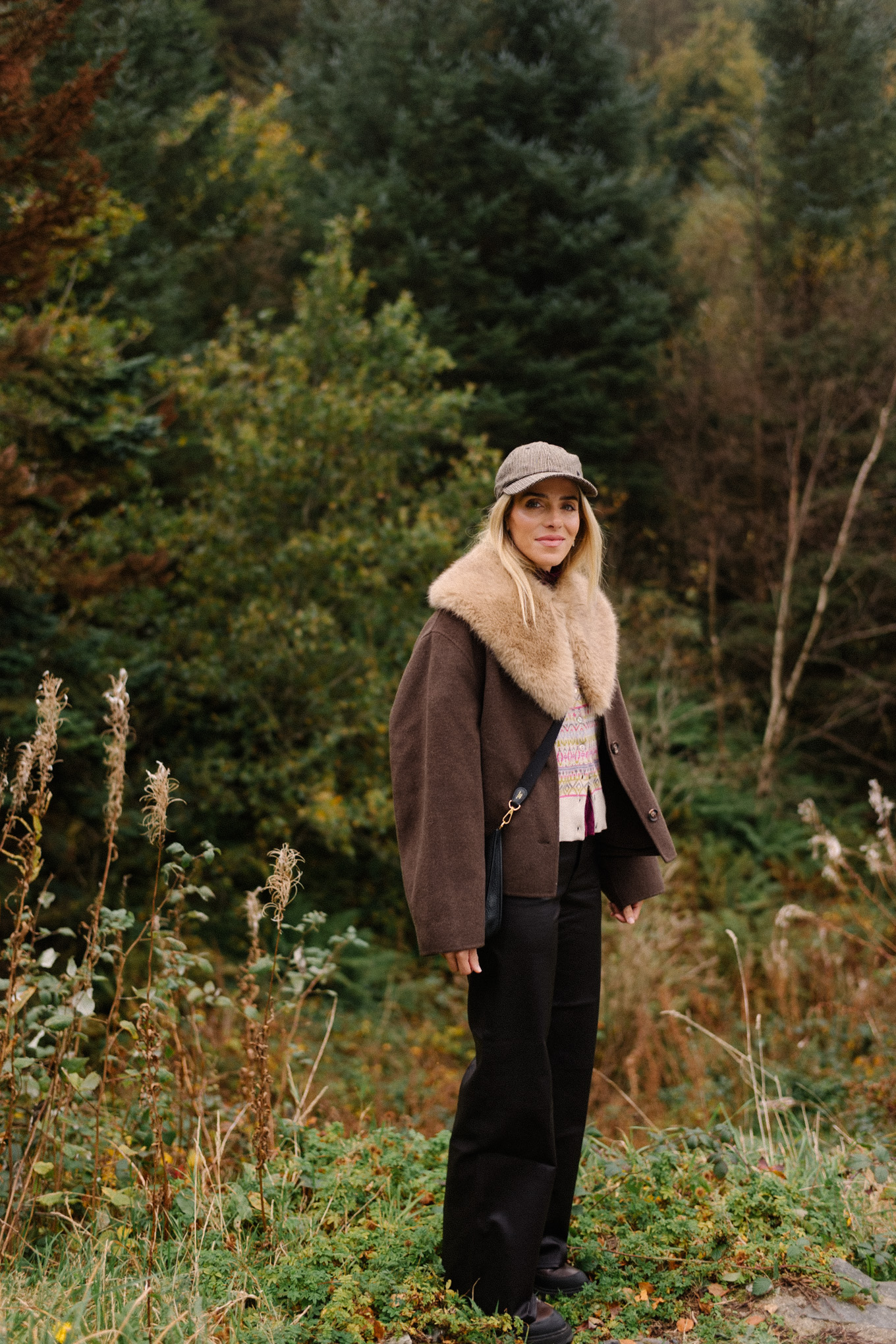 brown wool coat faux fur collar scarf black leather pants cashmere cardigan