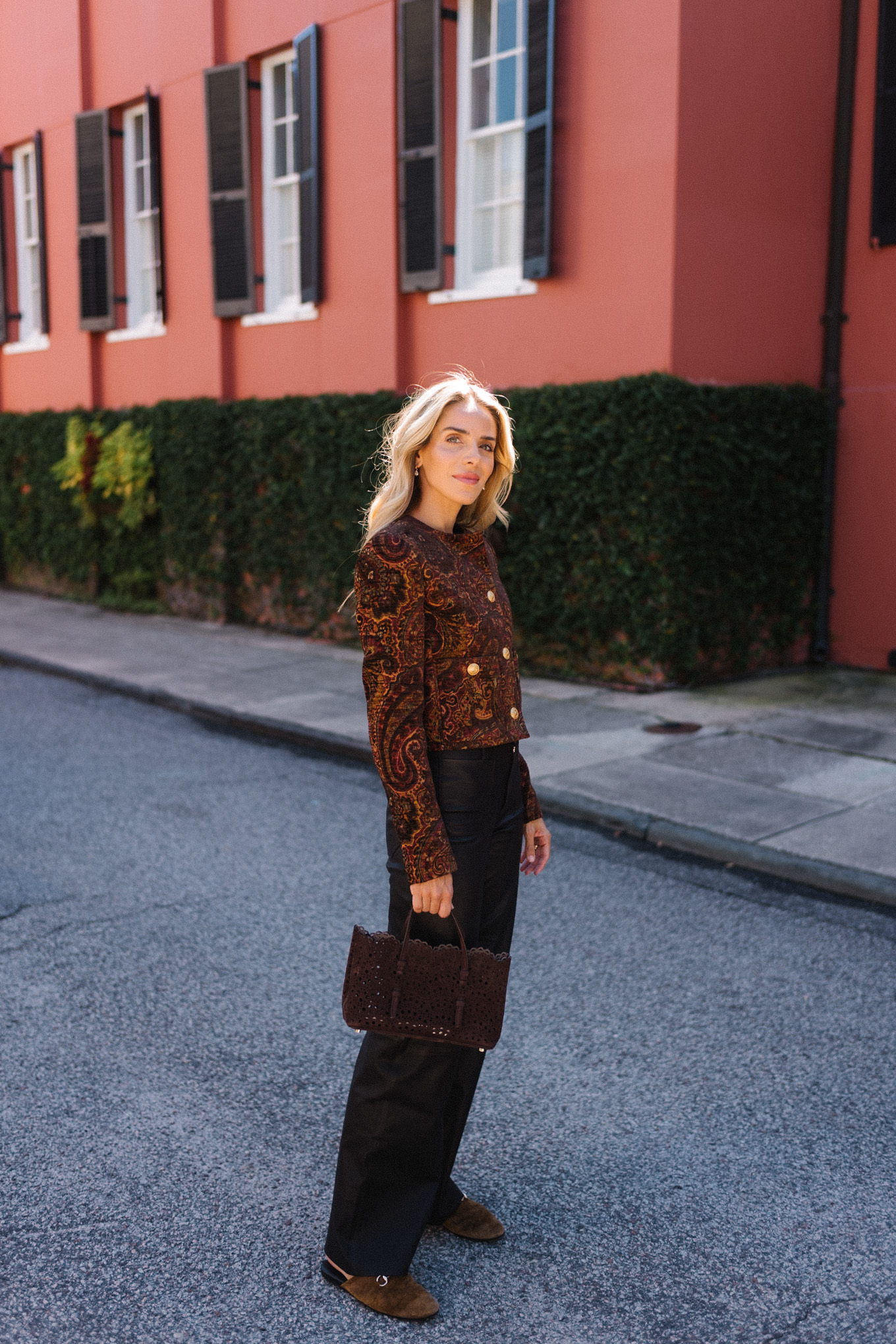 tailored jacket small suede bag suede mules leather pants