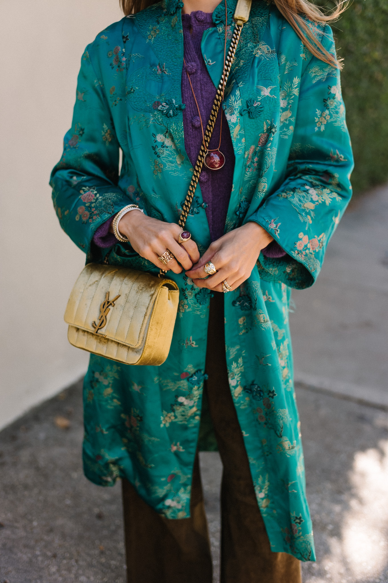 teal silk coat purple cashmere sweater brown suede pants gold suede bag brown flats