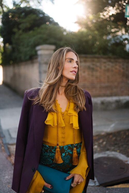 plum blazer gold ruffle blouse jacquard pants turquoise clutch purple pumps