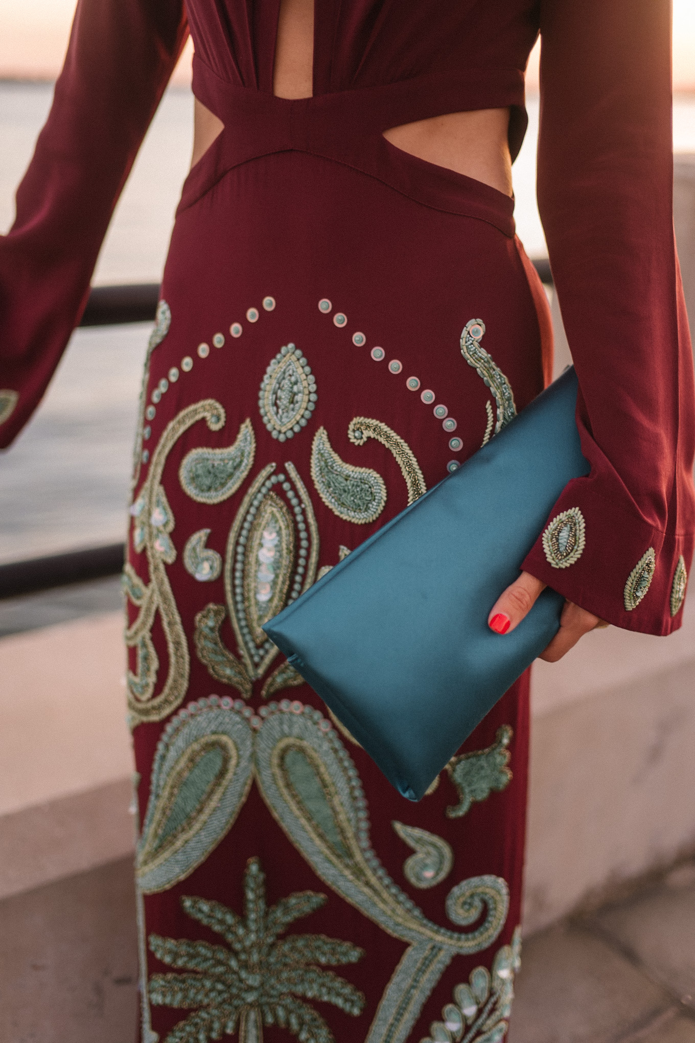 maroon and teal silk beaded gown turquoise clutch pink heels diamond earrings